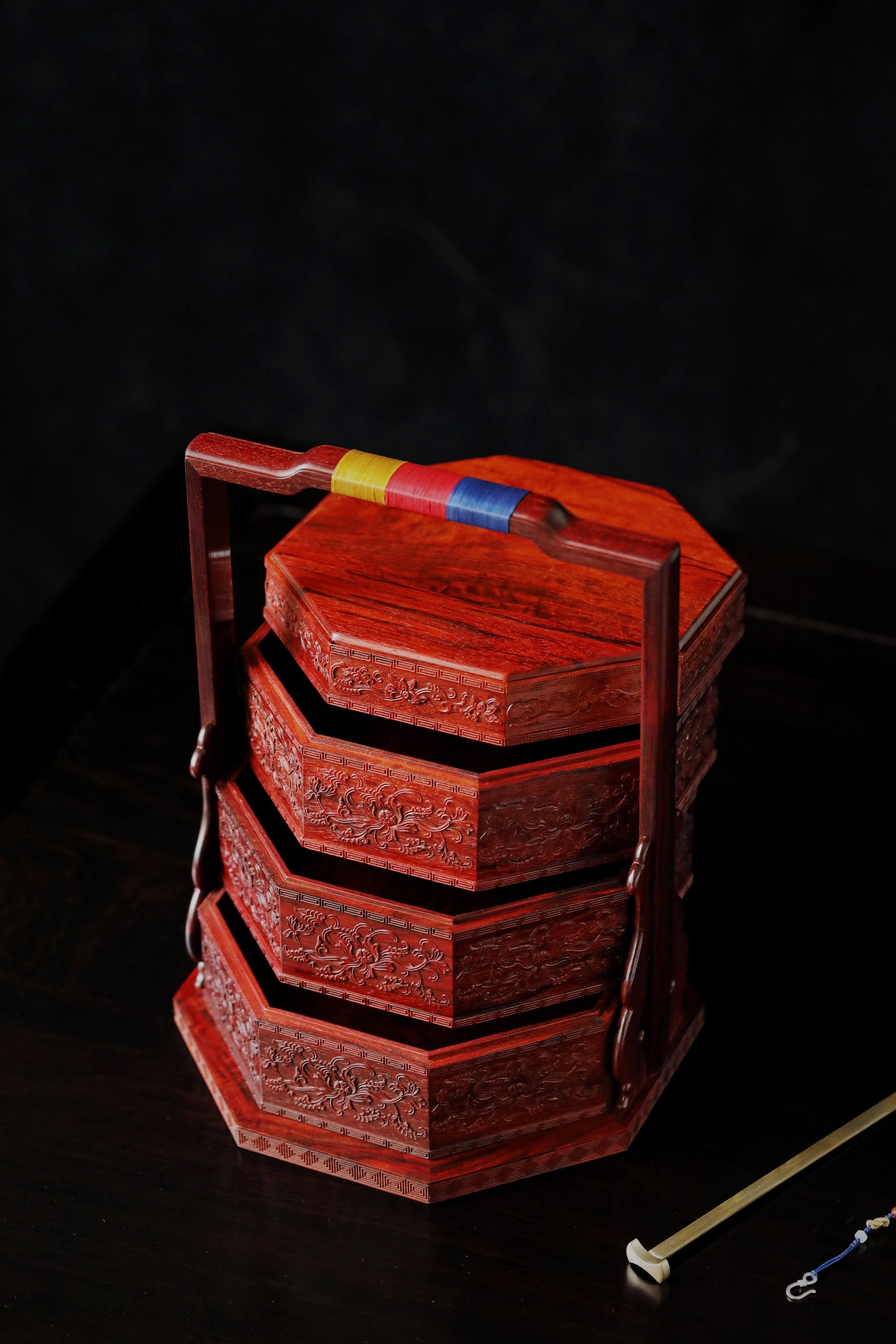 Small-leaf sandalwood carved octagonal box with passionflower design