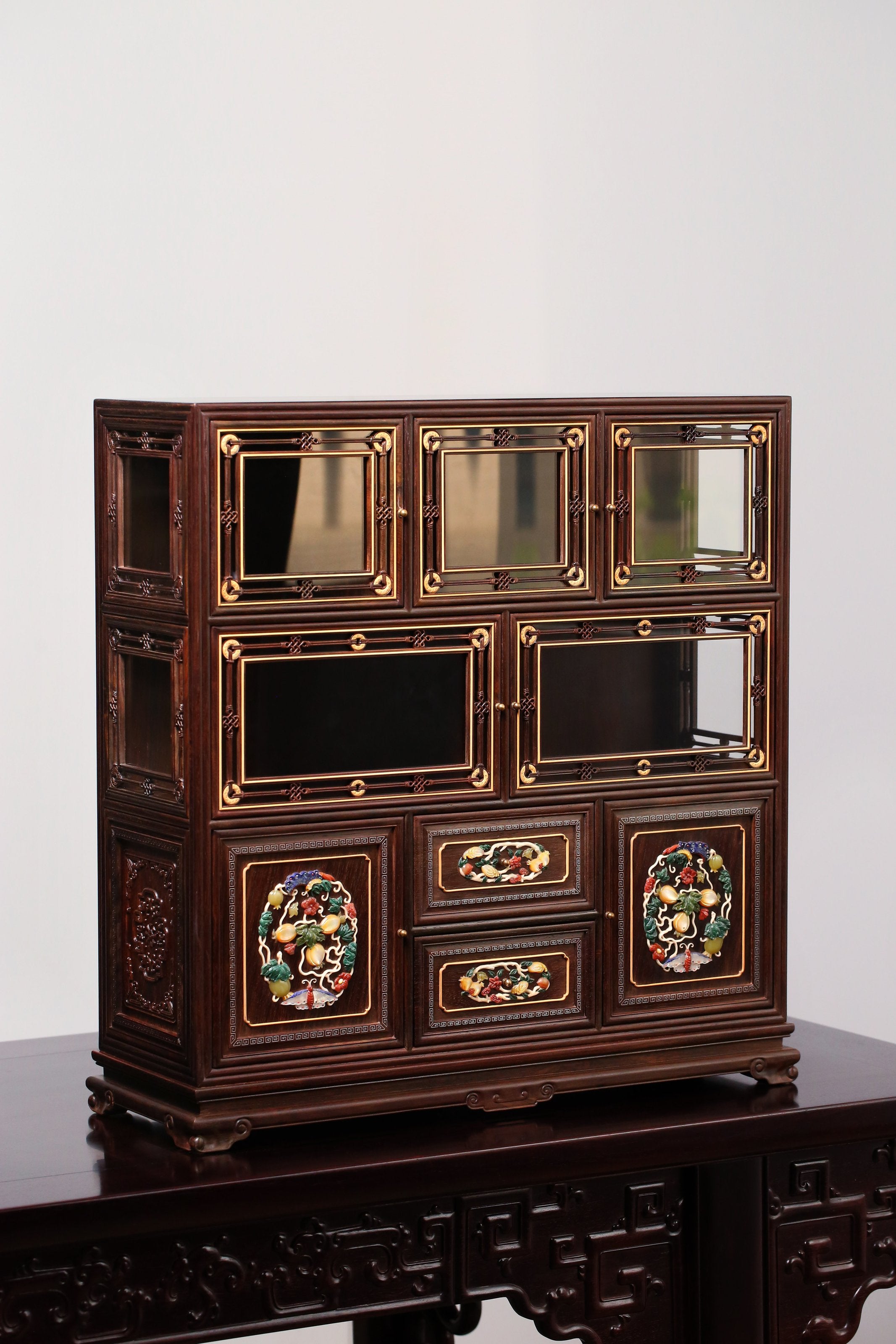 Palace replica of a multi-treasure cabinet with melon and butterfly patterns