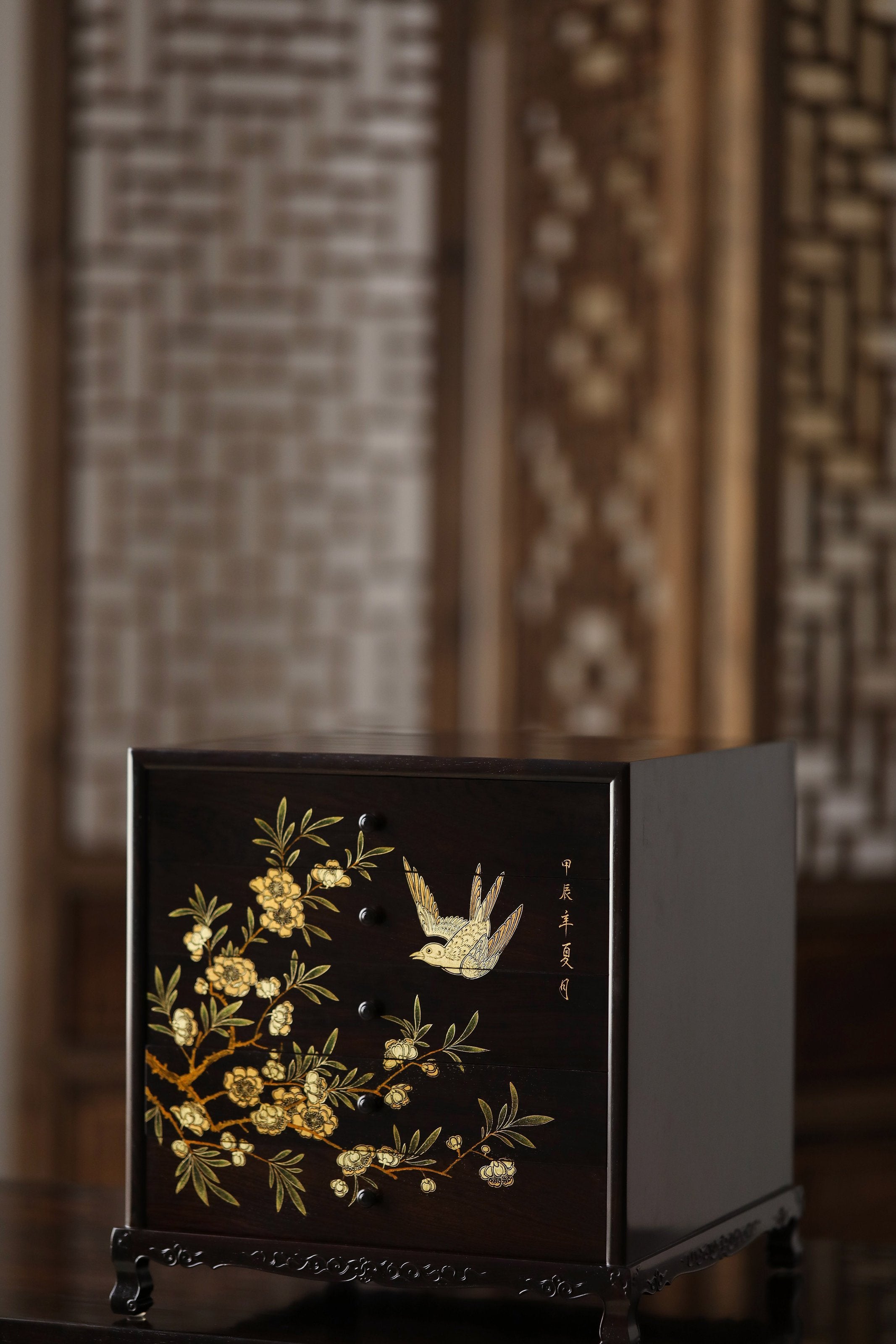 Gold piled high, joy on eyebrows / Wealth and good fortune on the table, five cups of tea on the sideboard