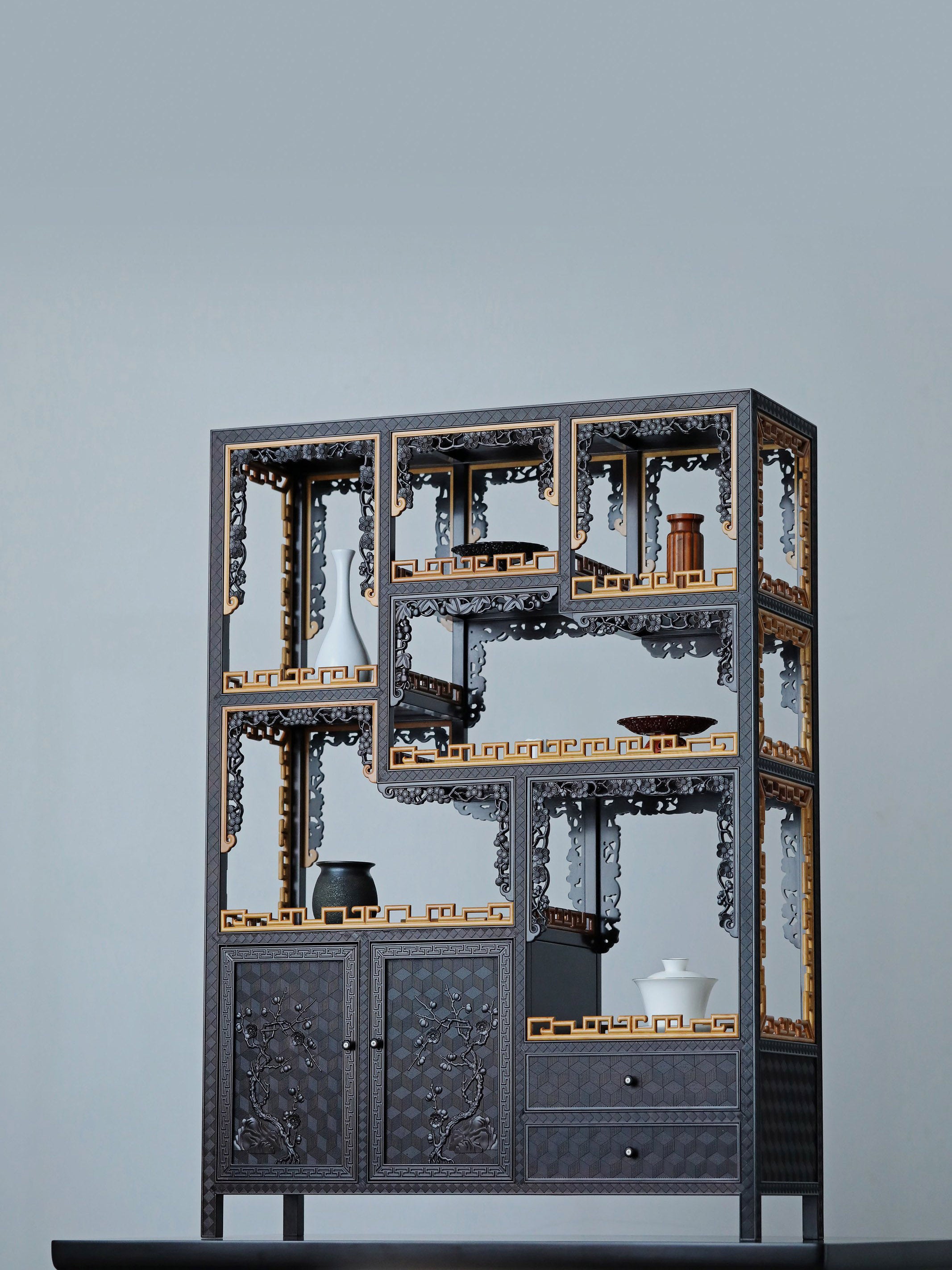 Purple sandalwood table with boxwood brocade pattern and plum blossom branch display shelf