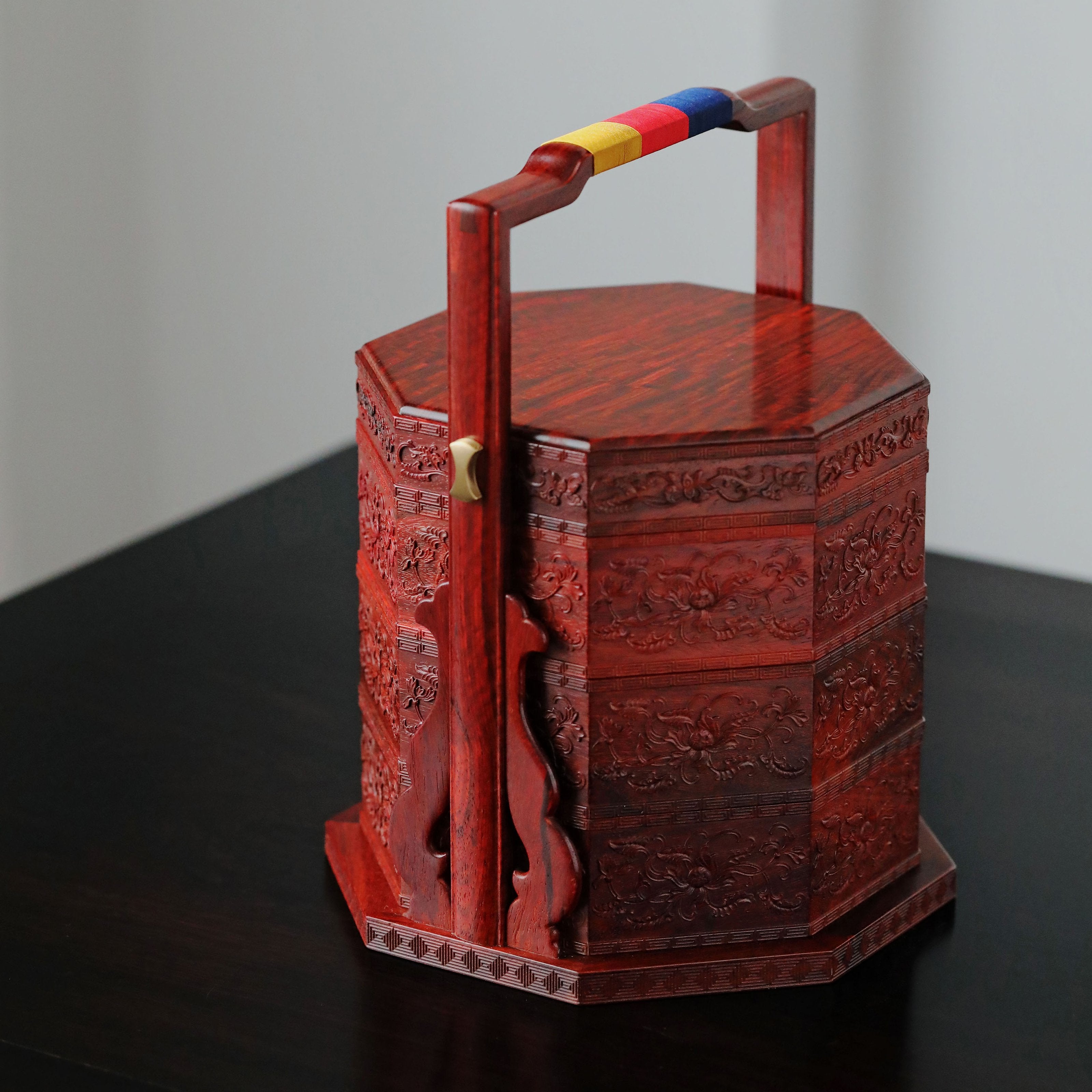 Small-leaf sandalwood carved octagonal box with passionflower design