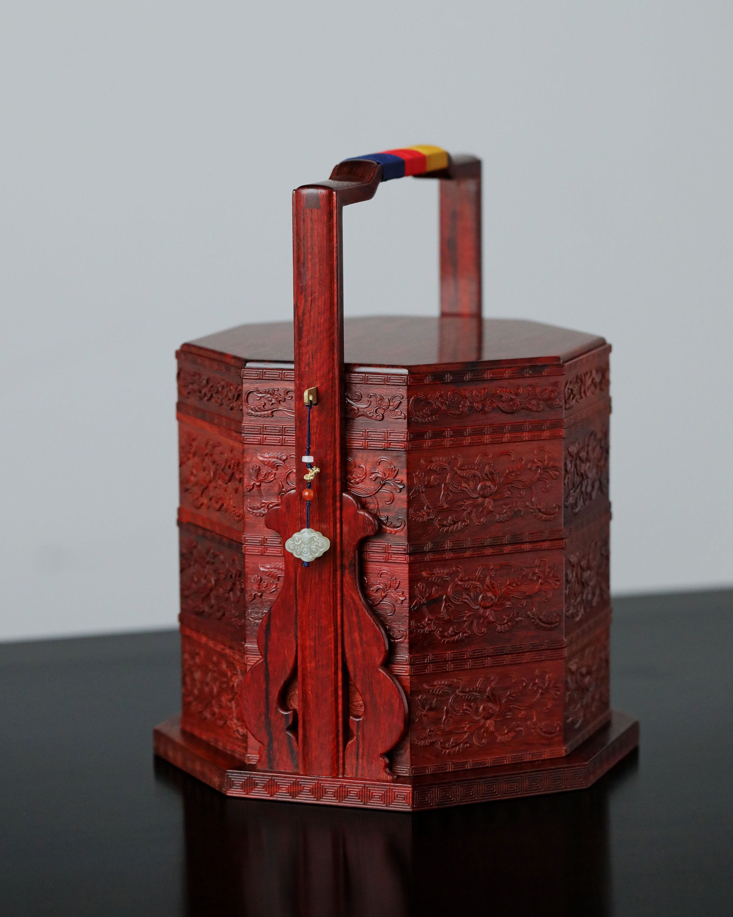 Small-leaf sandalwood carved octagonal box with passionflower design