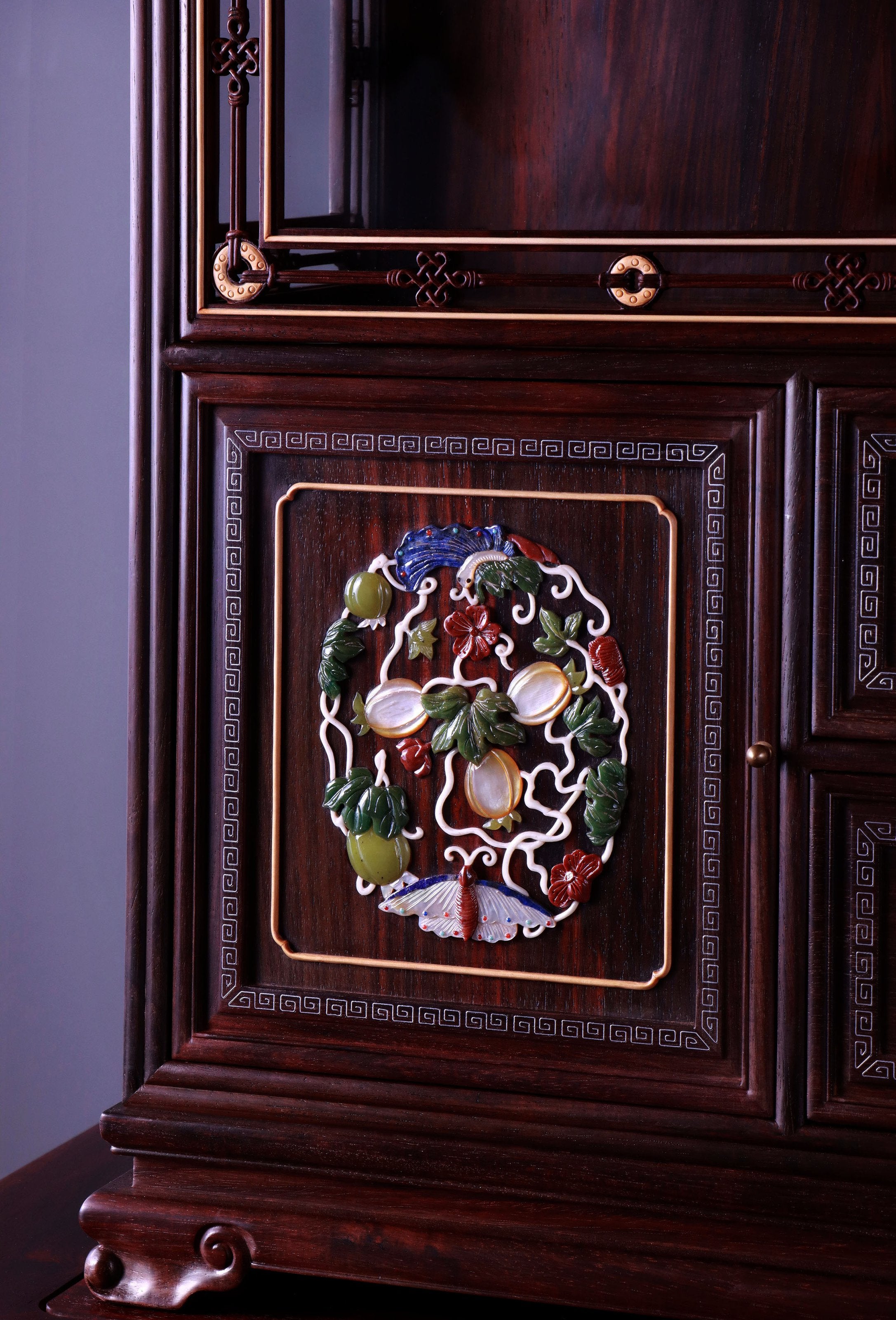Palace replica of a multi-treasure cabinet with melon and butterfly patterns