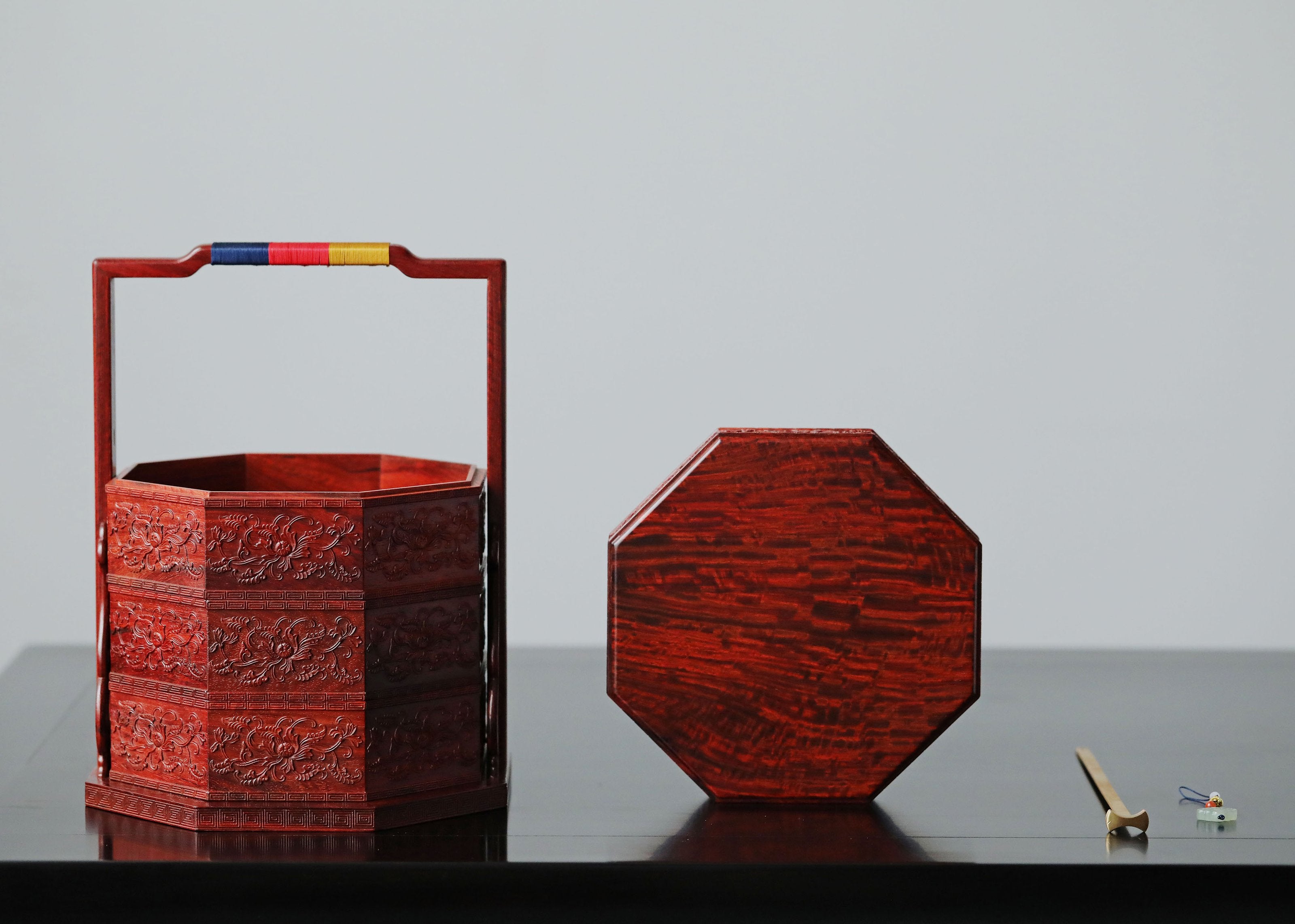 Small-leaf sandalwood carved octagonal box with passionflower design