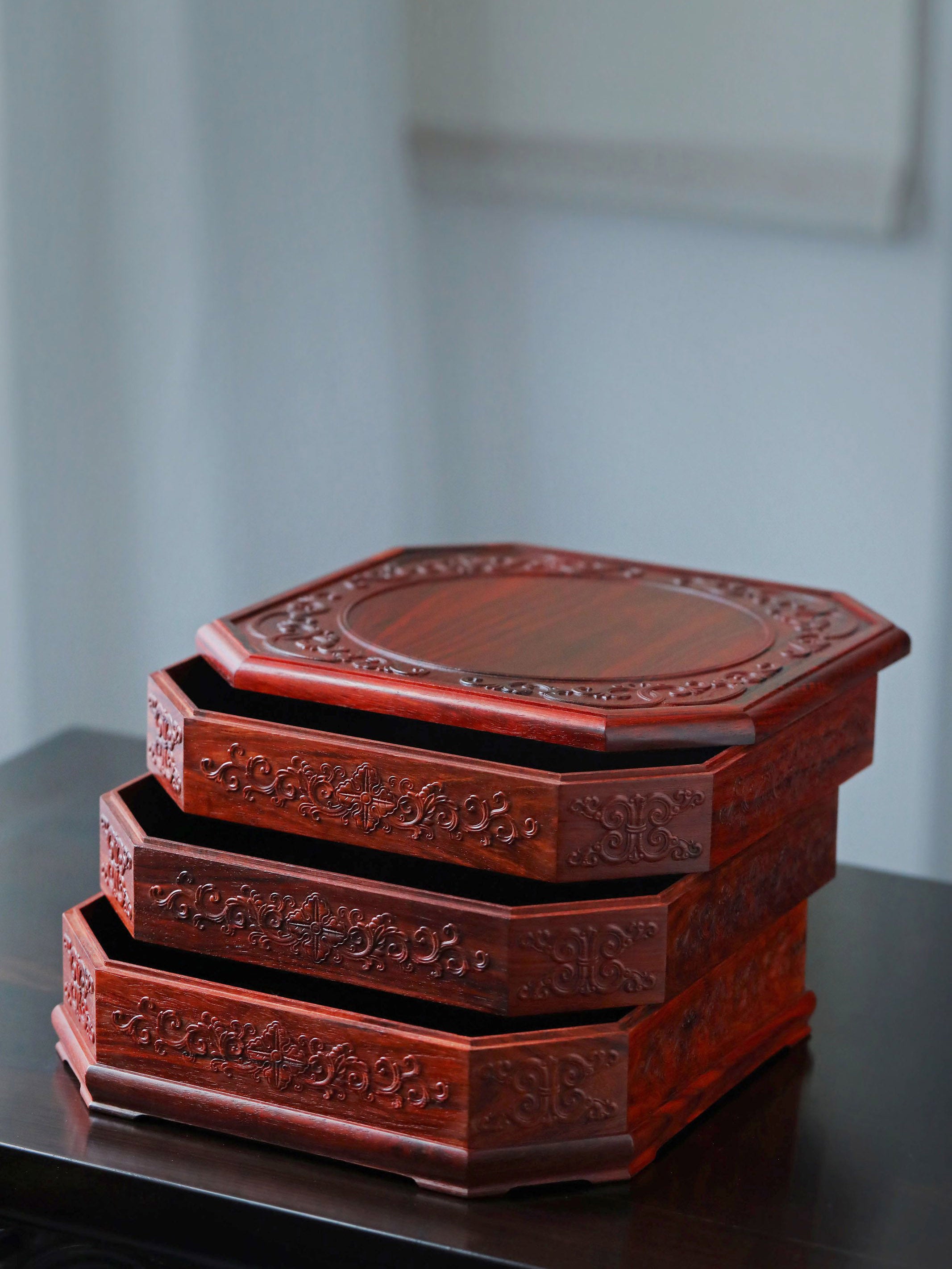 Three-layered octagonal tea box made of small-leaf sandalwood