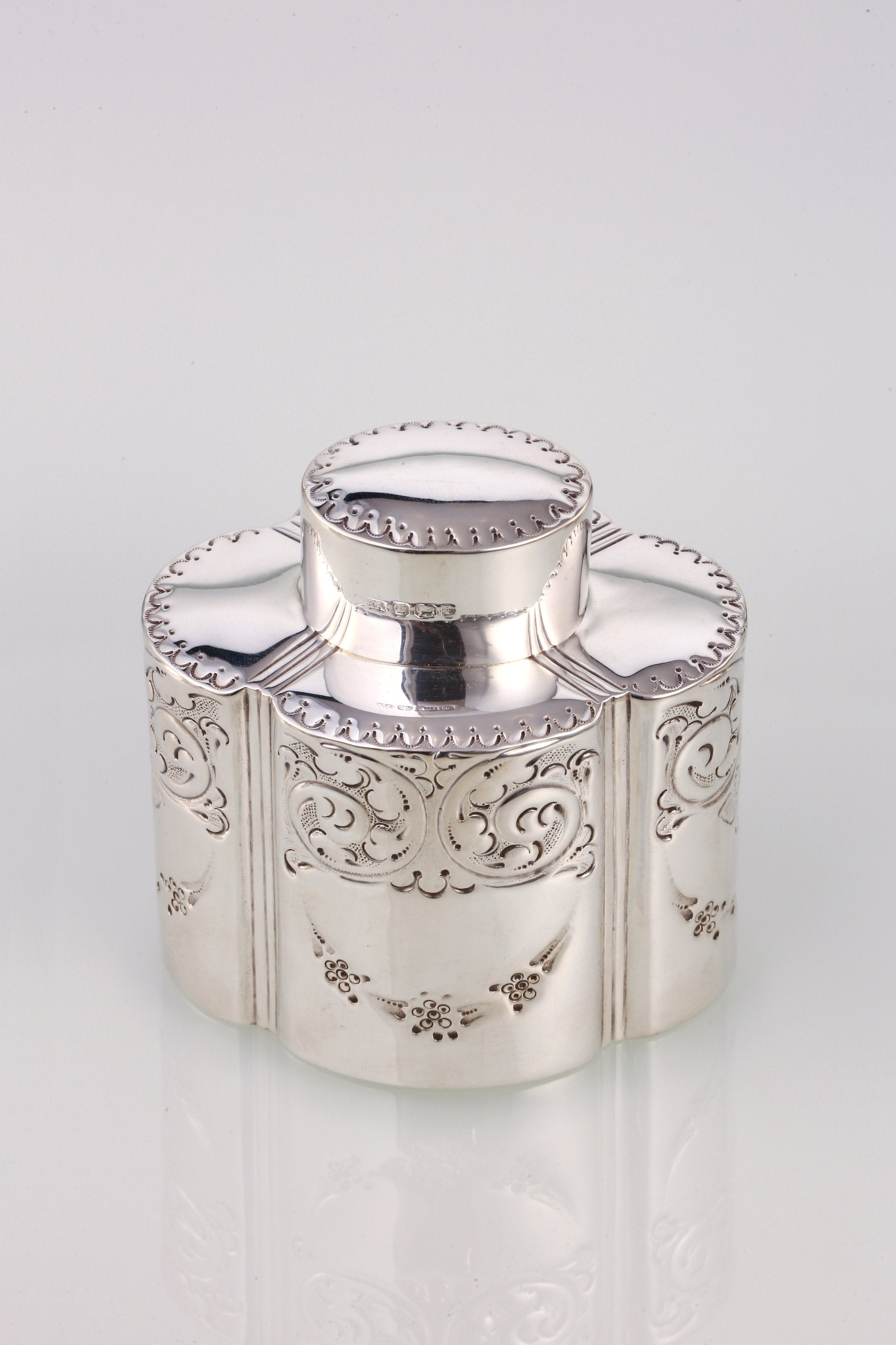 Atkin made sterling silver tea caddies in Sheffield in 1895.