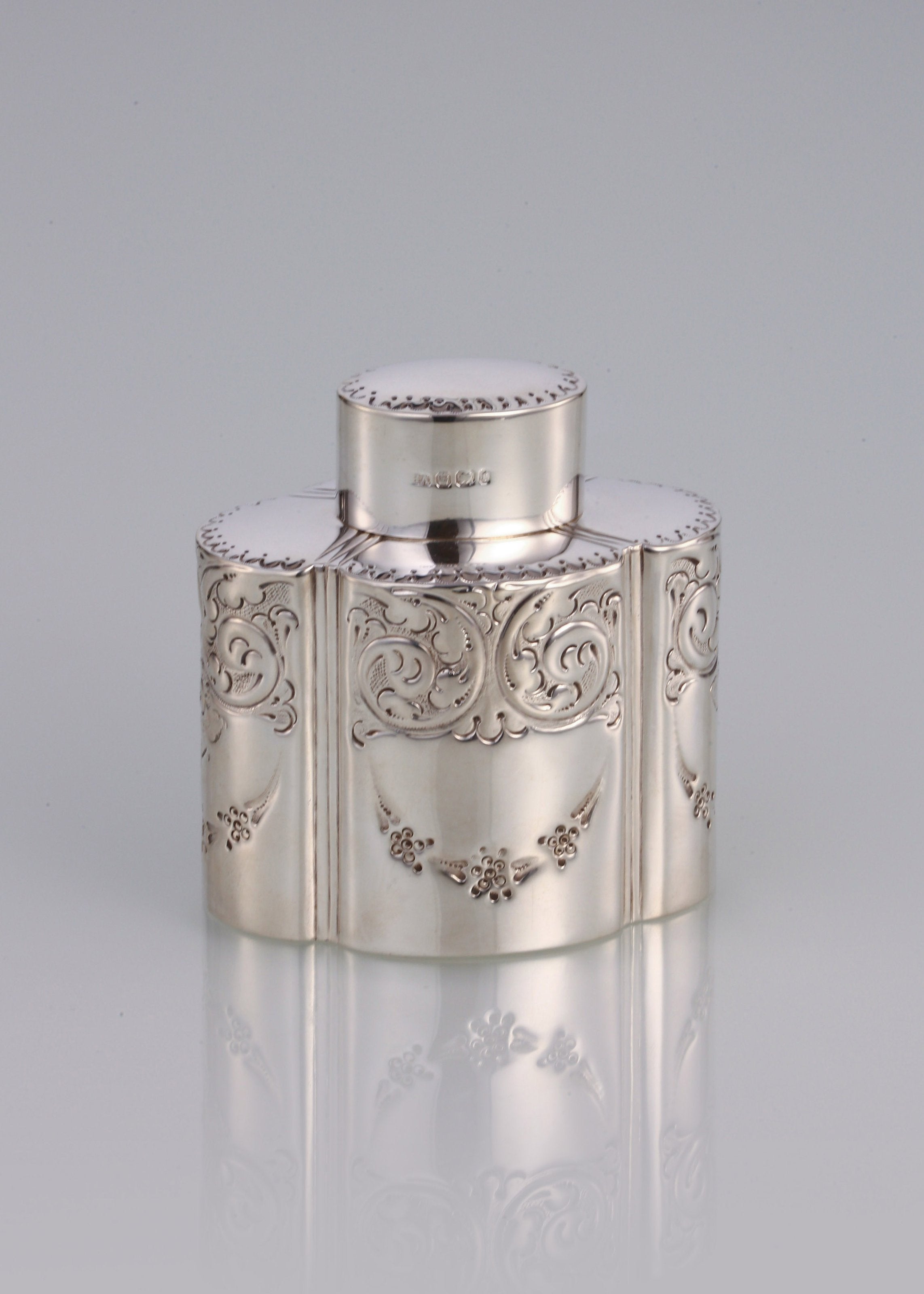 Atkin made sterling silver tea caddies in Sheffield in 1895.