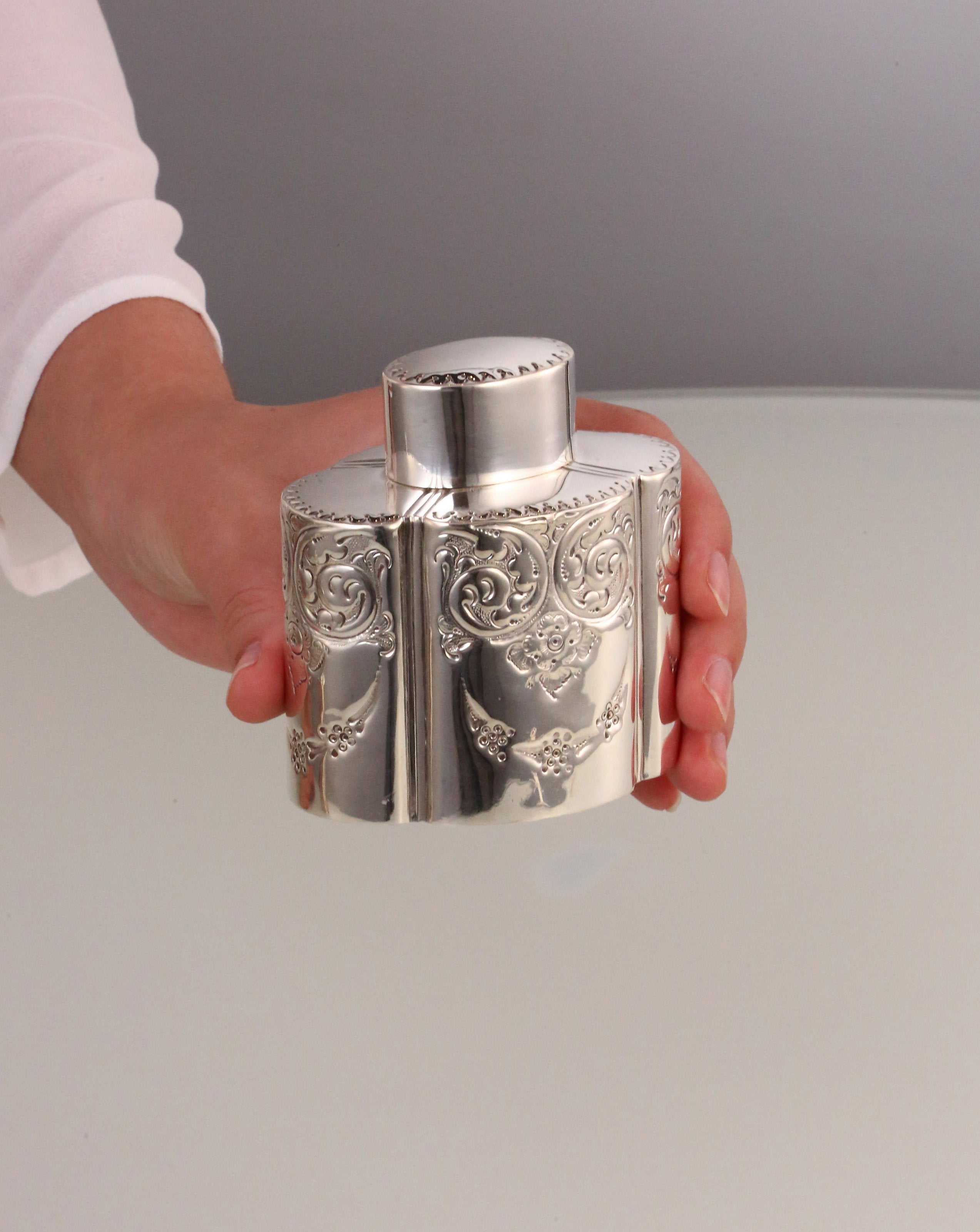 Atkin made sterling silver tea caddies in Sheffield in 1895.