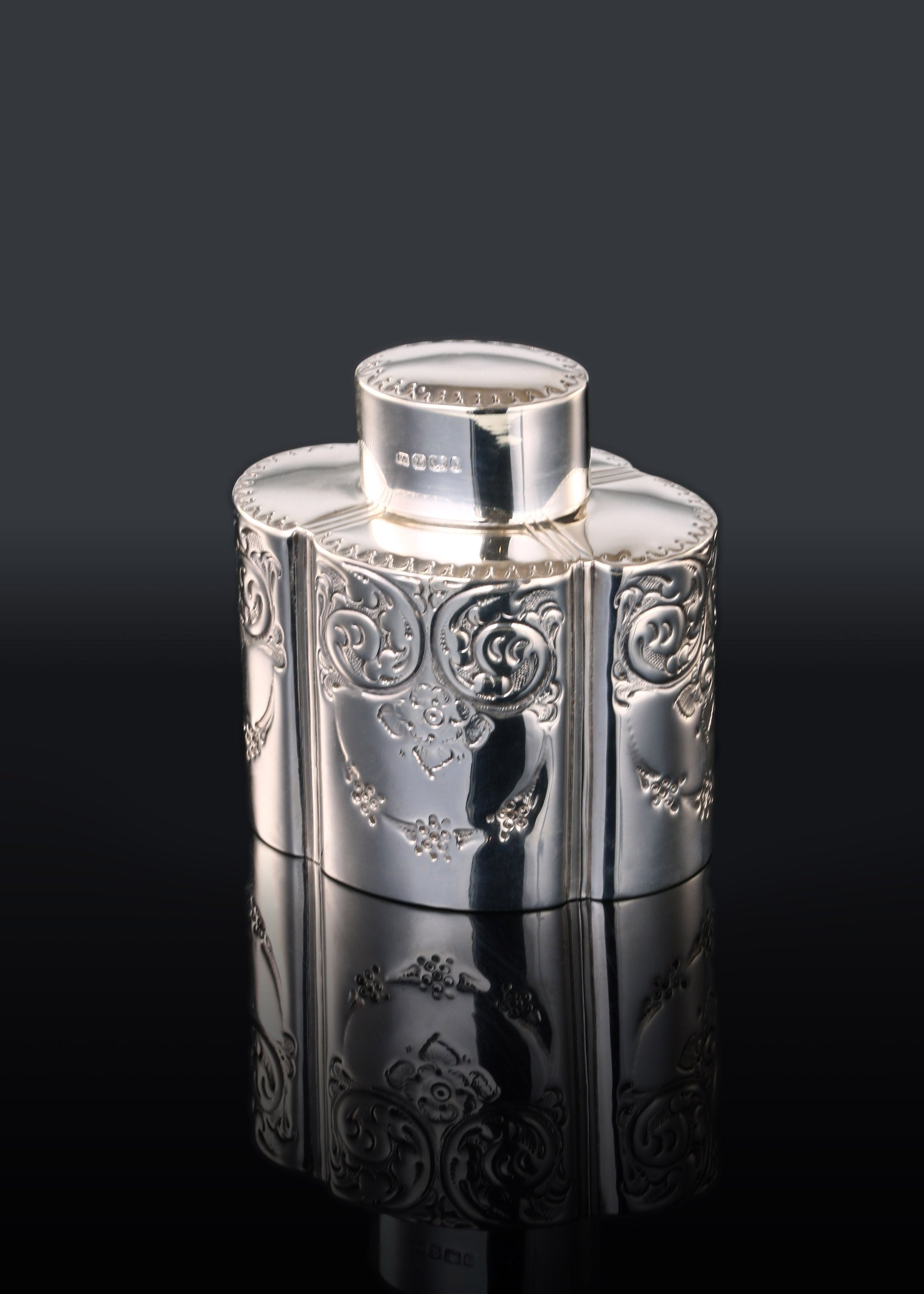Atkin made sterling silver tea caddies in Sheffield in 1895.
