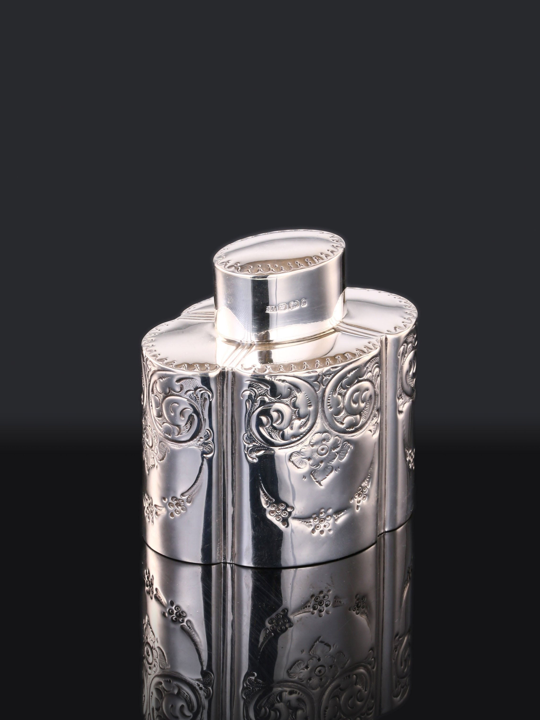 Atkin made sterling silver tea caddies in Sheffield in 1895.