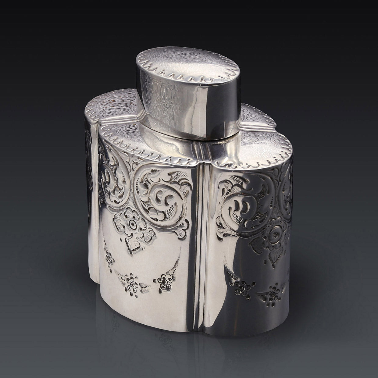 Atkin made sterling silver tea caddies in Sheffield in 1895.