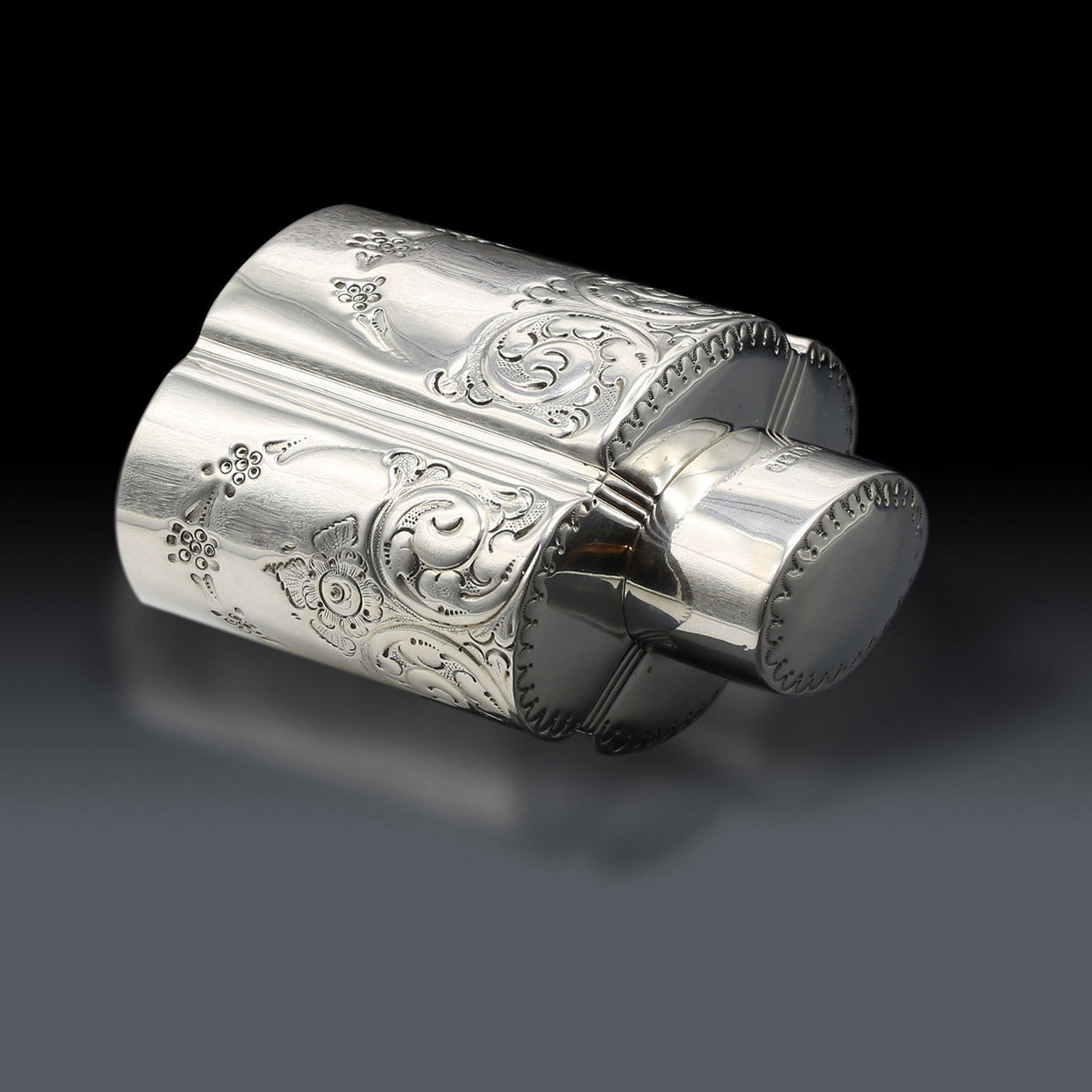 Atkin made sterling silver tea caddies in Sheffield in 1895.