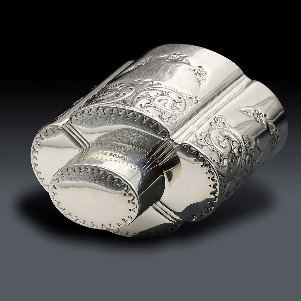 Atkin made sterling silver tea caddies in Sheffield in 1895.