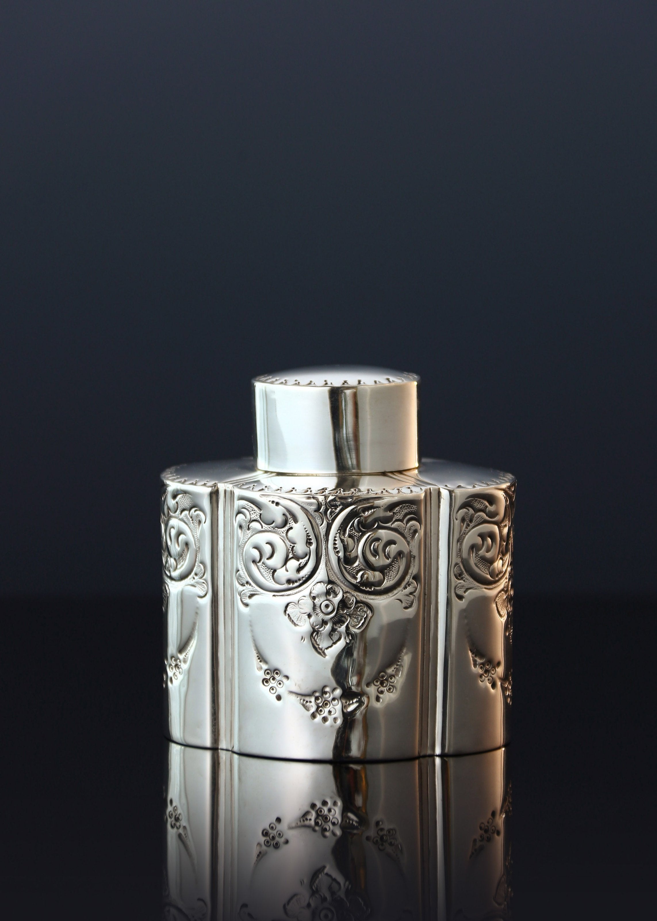 Atkin made sterling silver tea caddies in Sheffield in 1895.