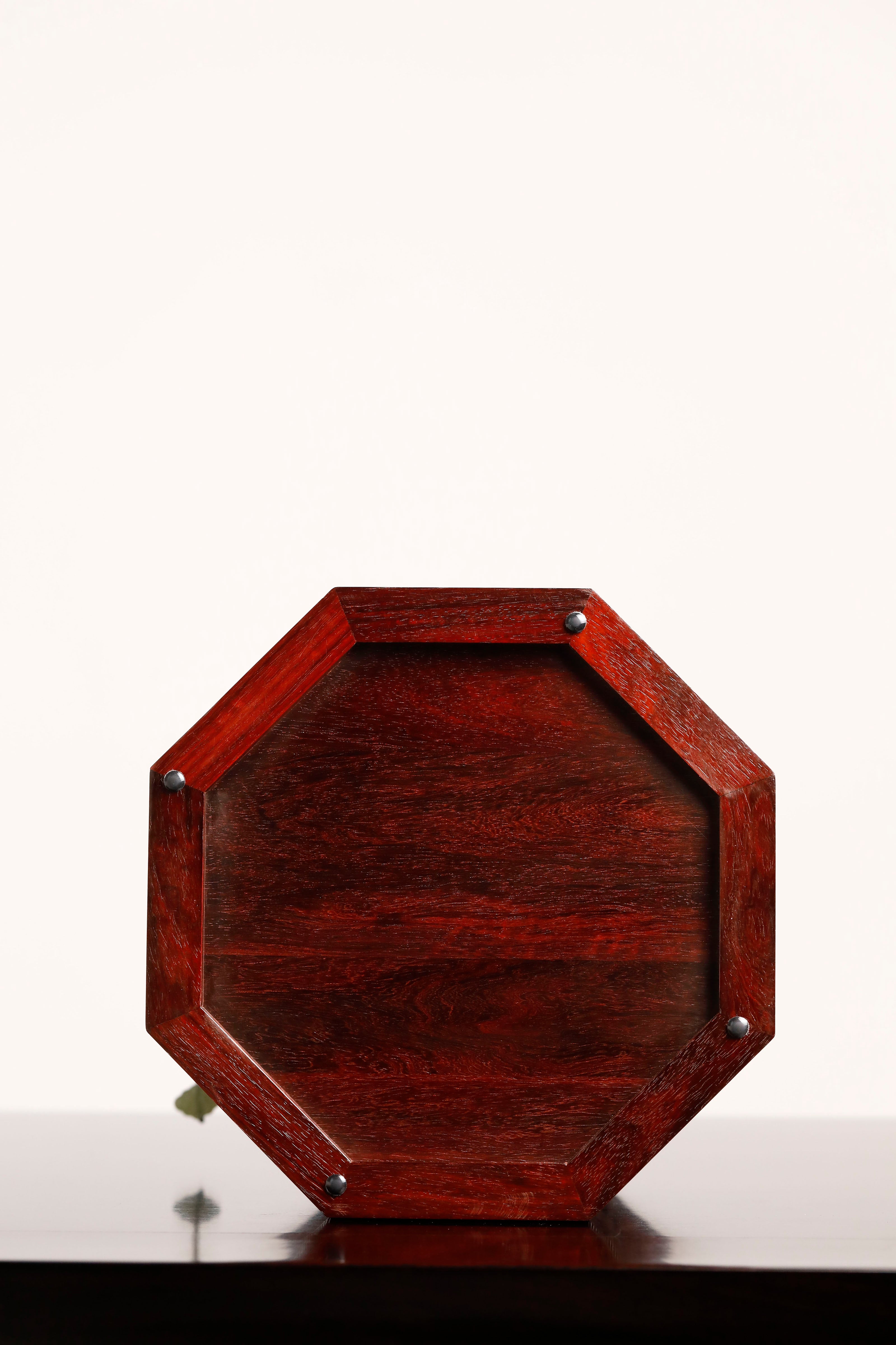 Small-leaf sandalwood octagonal box inlaid with precious stones, symbolizing joy and laughter.