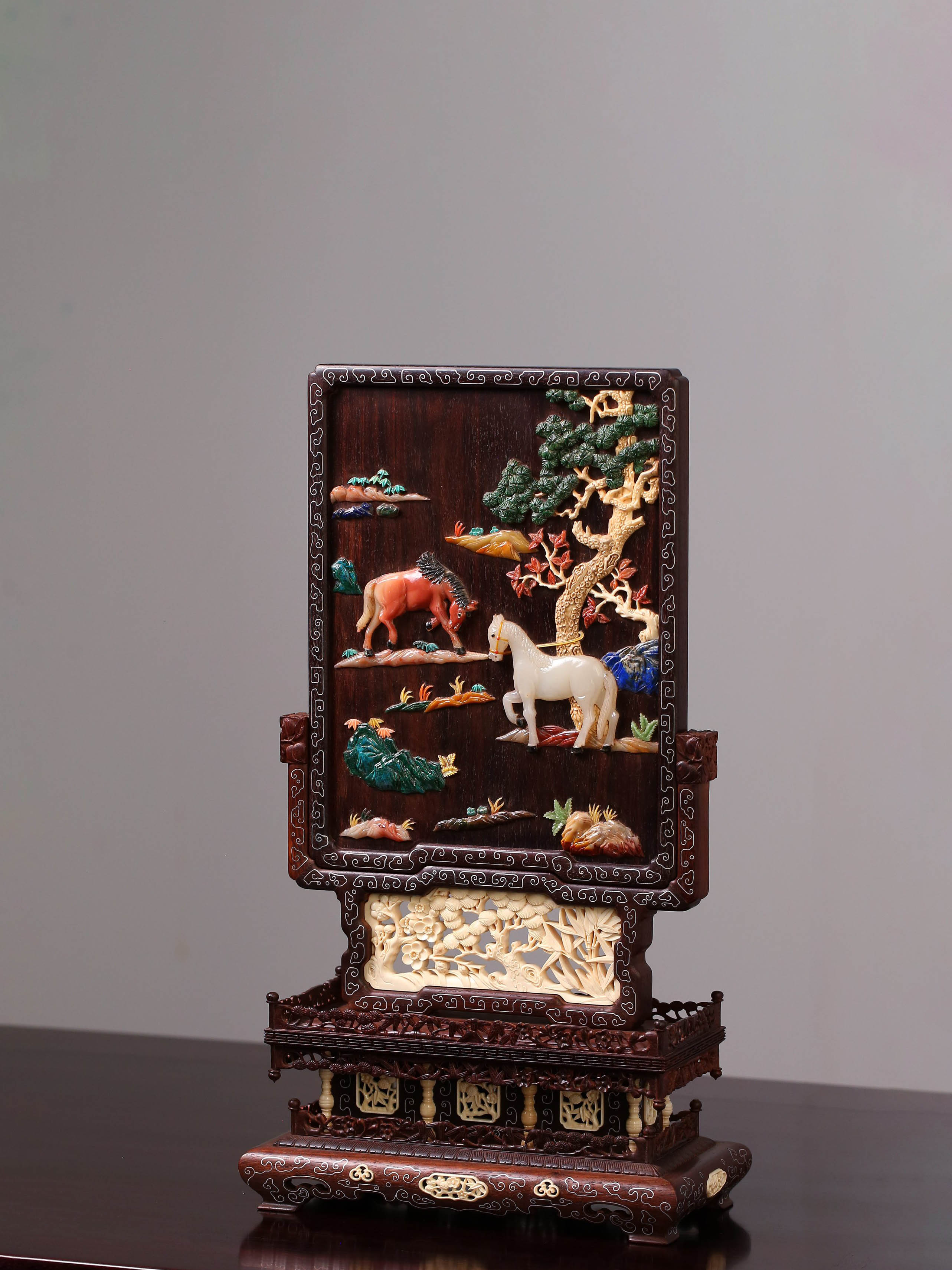 Rosewood screen inlaid with precious stones and silver filigree