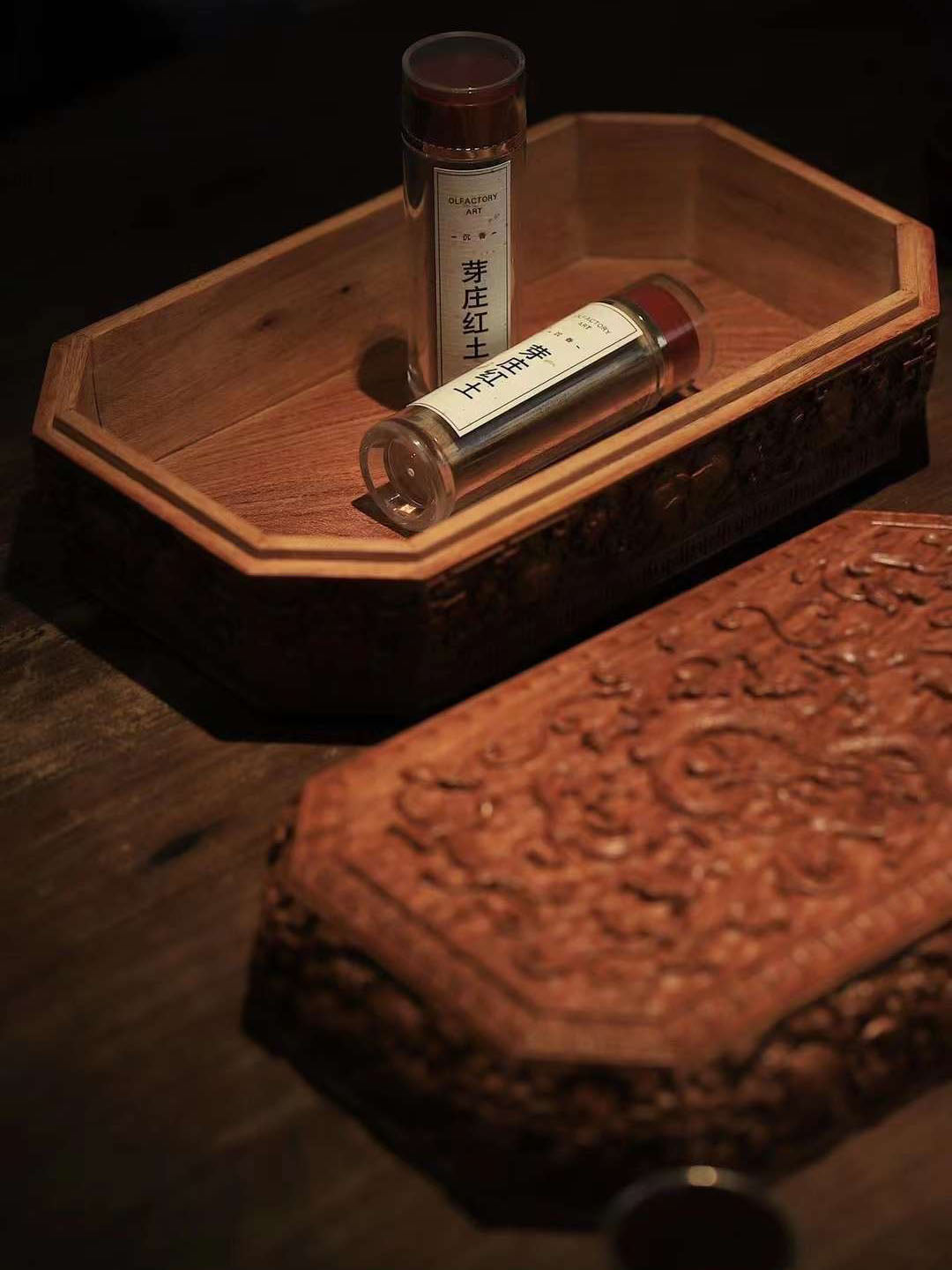 Tea box with full carving of lychee, butterfly, and dragon patterns