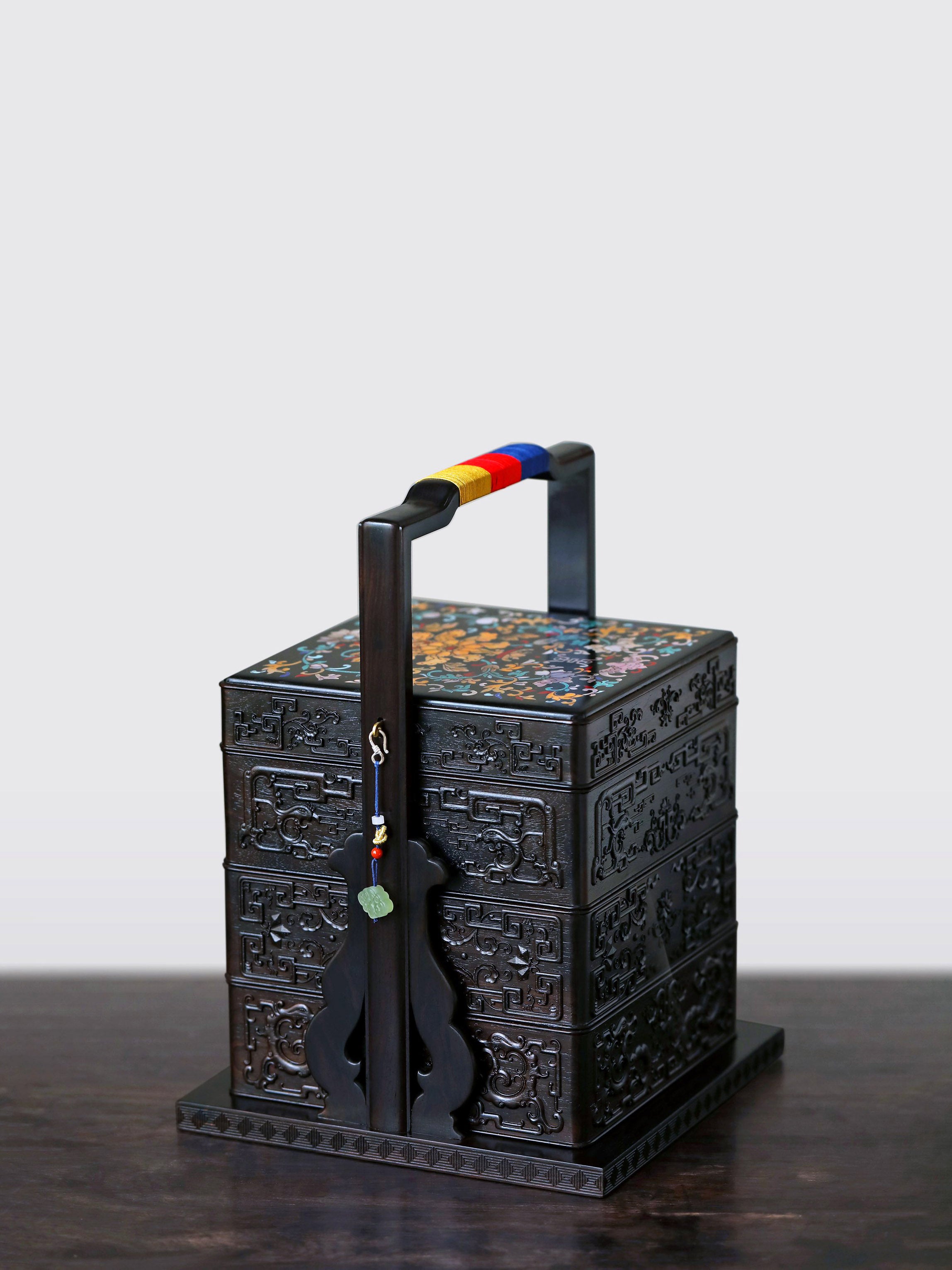 Purple sandalwood inlaid mother-of-pearl square carrying box with auspicious motifs of longevity and good fortune