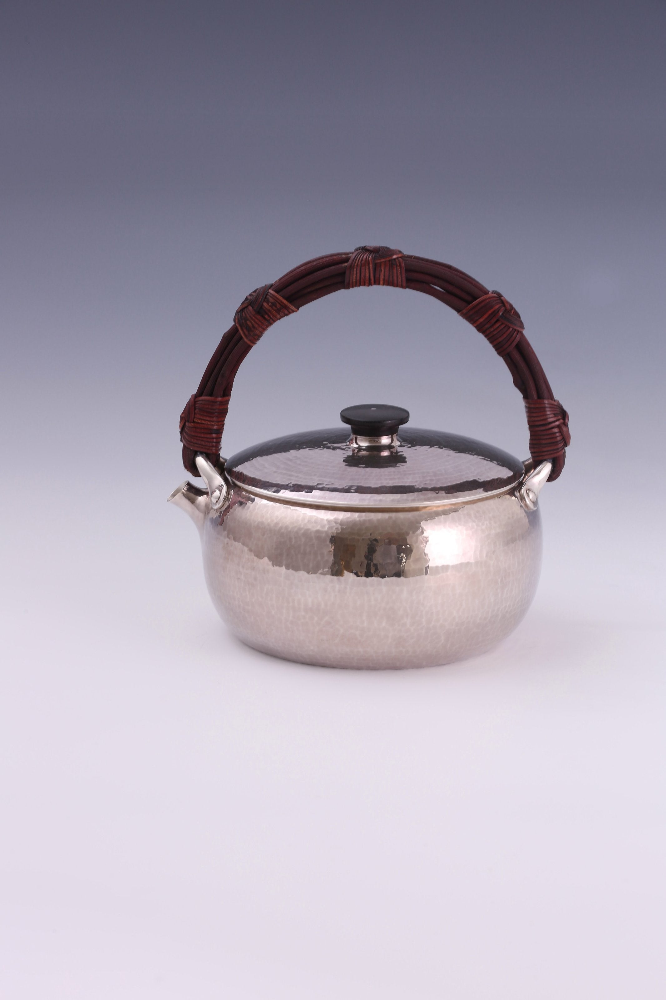 Large rattan spout, silver kettle, cast iron tea stove