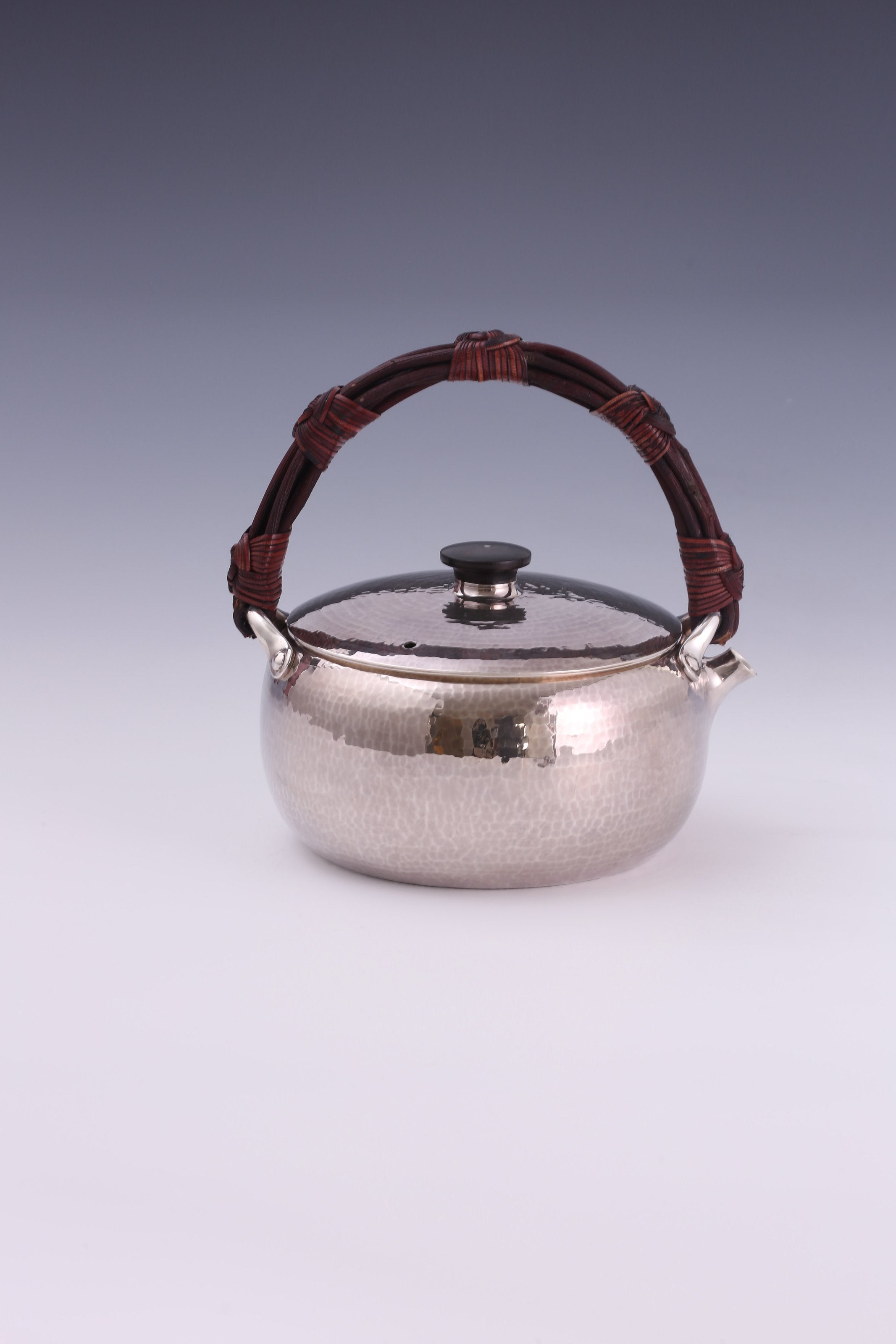 Large rattan spout, silver kettle, cast iron tea stove