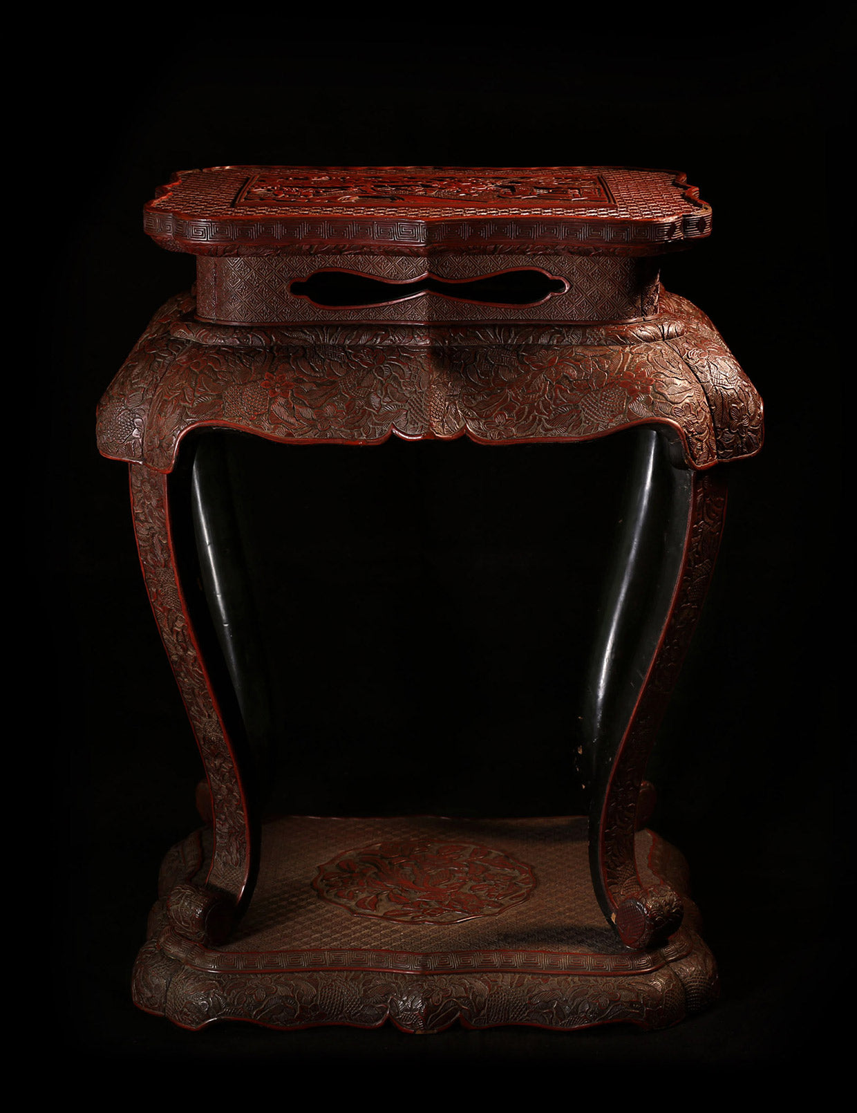 Lacquered and carved red incense table