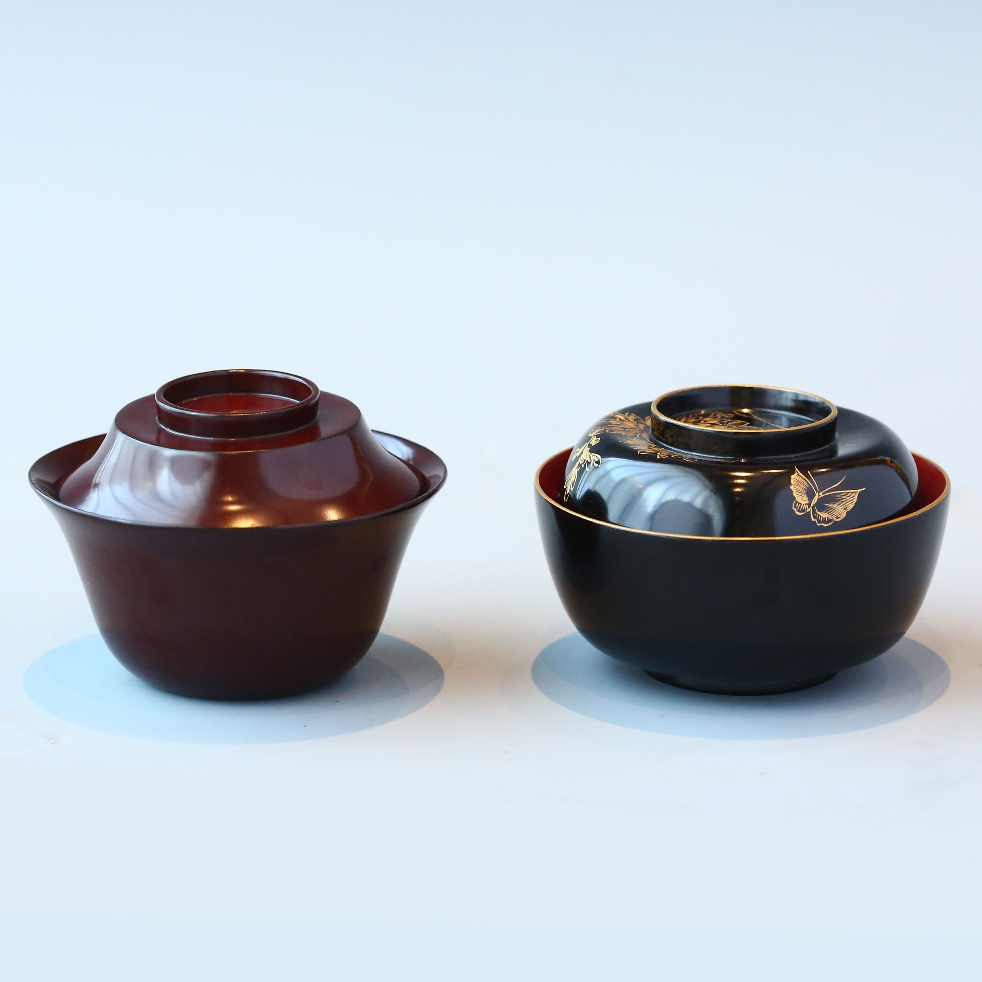 Two lacquered and gold-plated covered bowls
