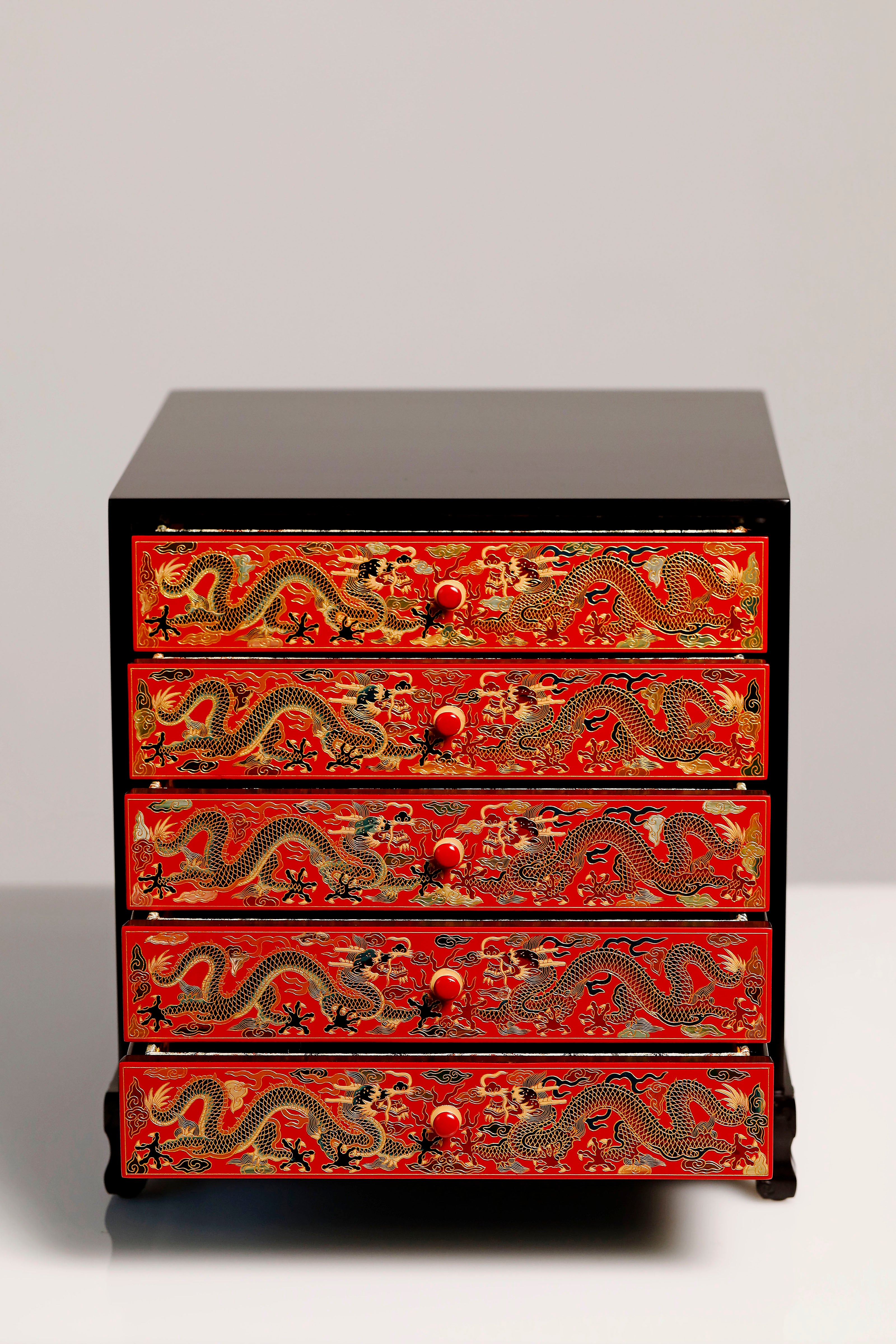 Purple sandalwood lacquer table with double dragons playing with a pearl, five-tiered tea cabinet