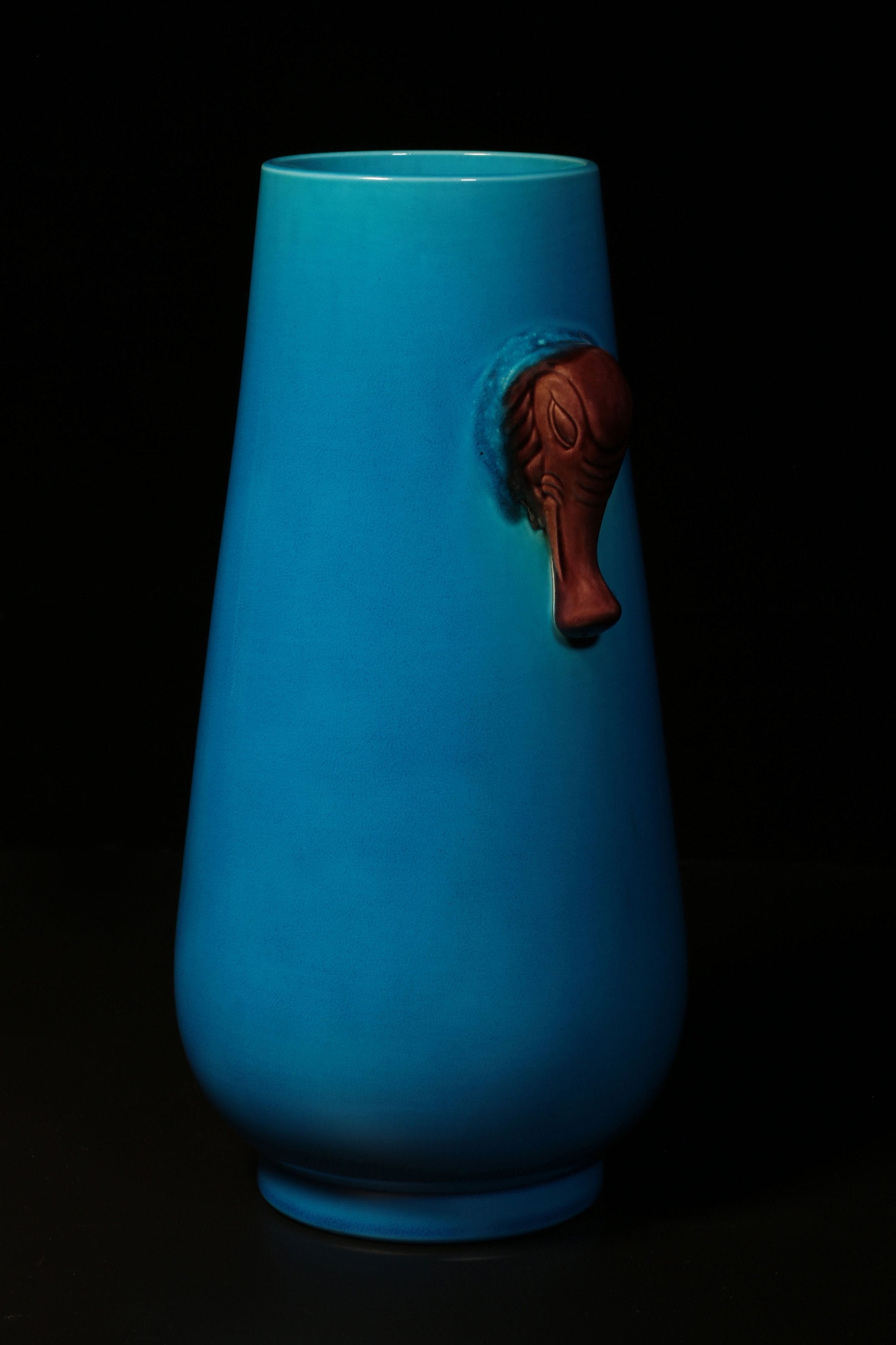 Falconite (peacock blue) elephant trunk bottle