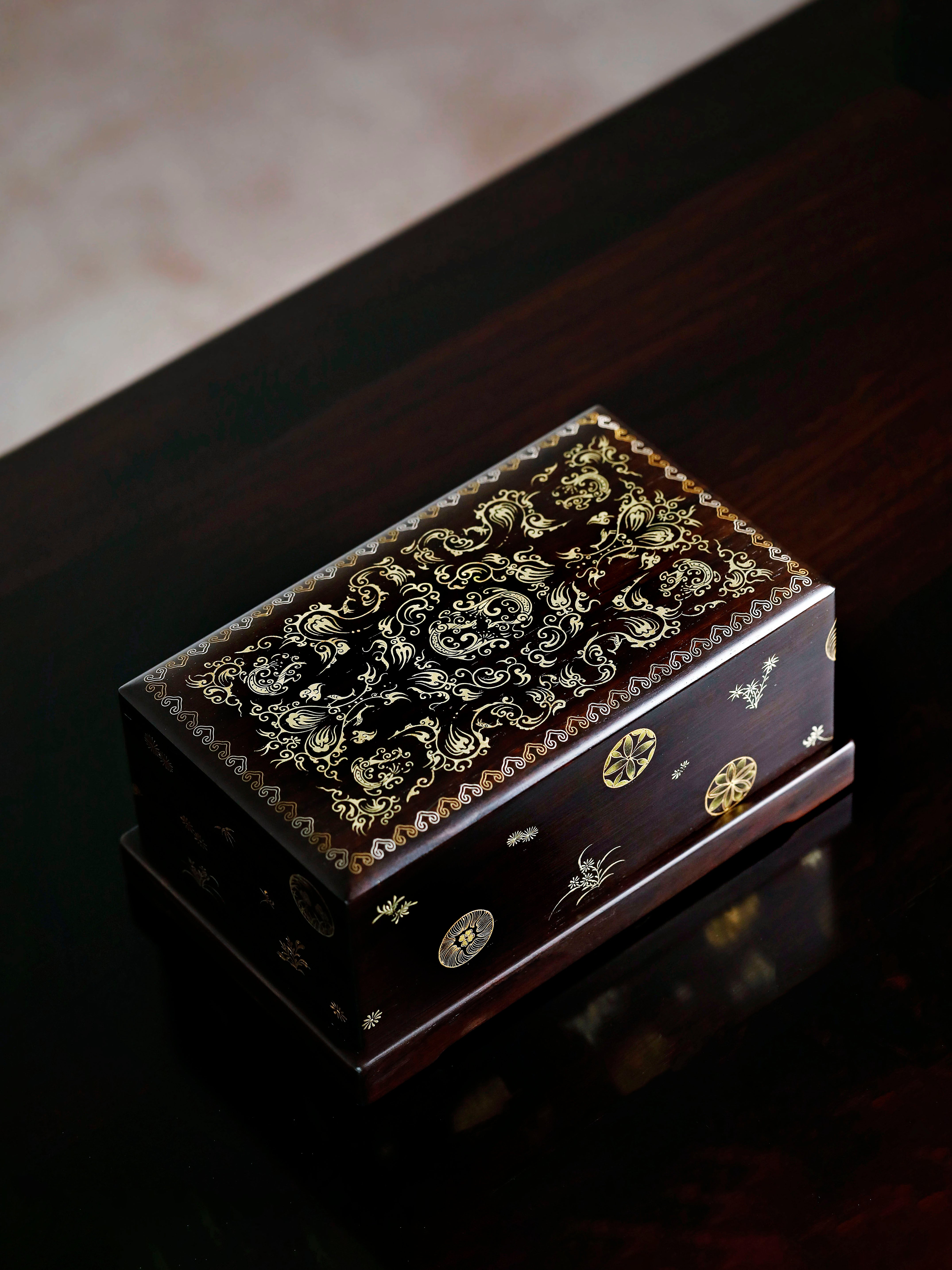 Purple sandalwood box with phoenix and gilded design