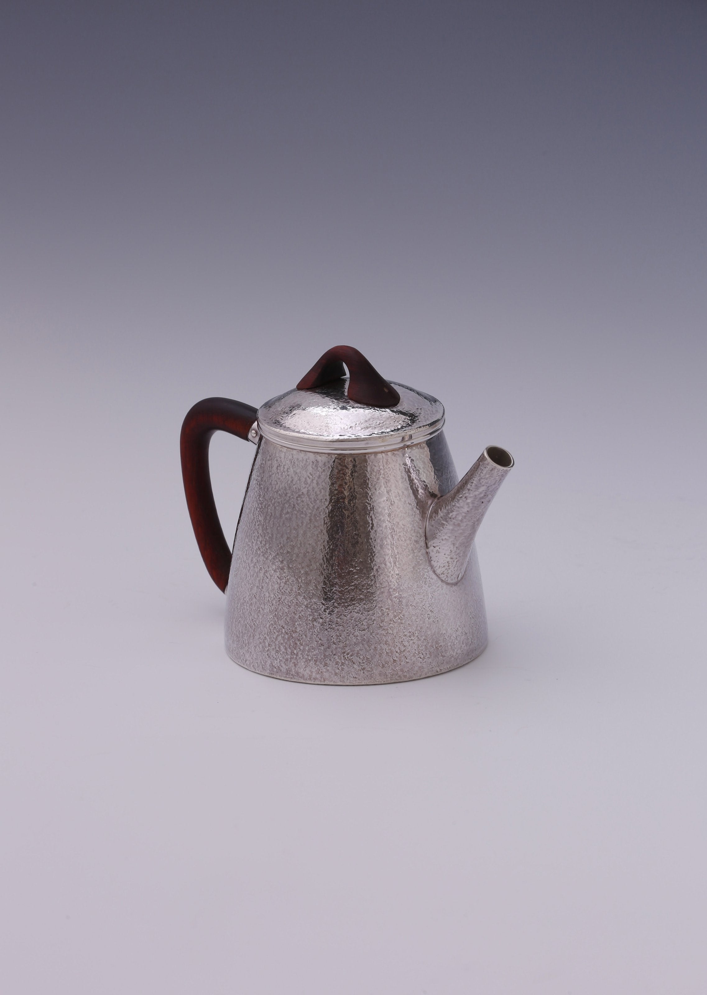 High stone silver tea pot