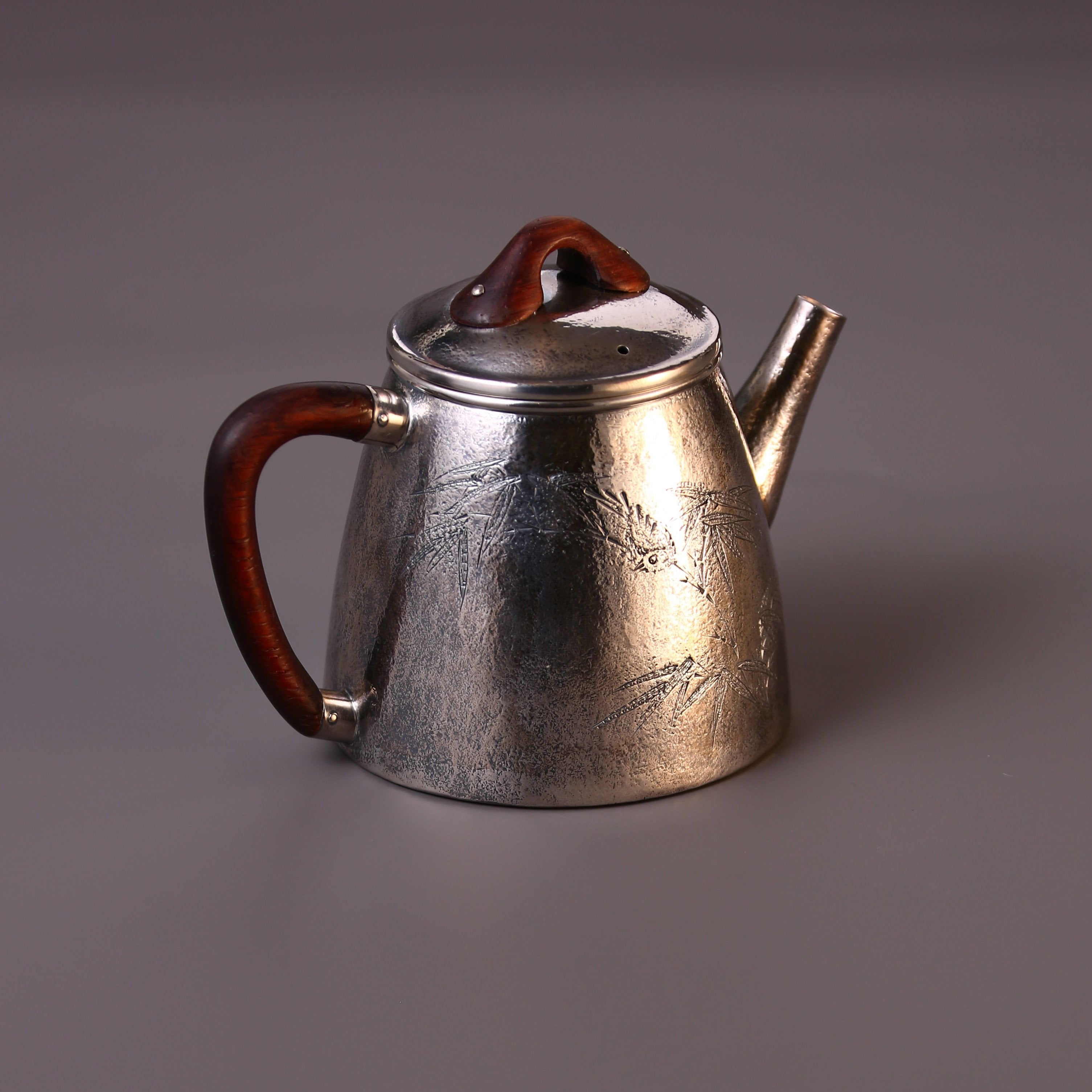 High stone silver tea pot