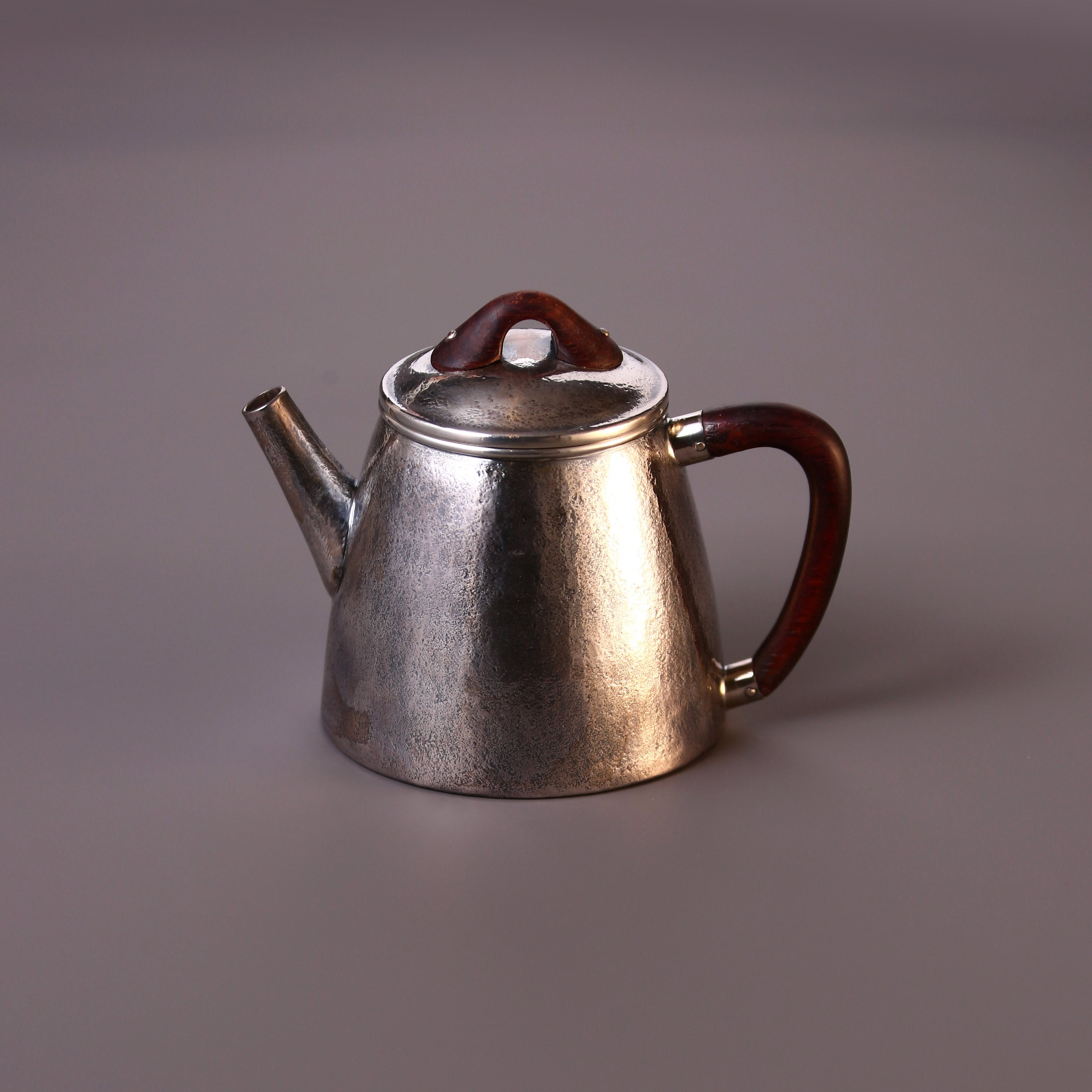 High stone silver tea pot