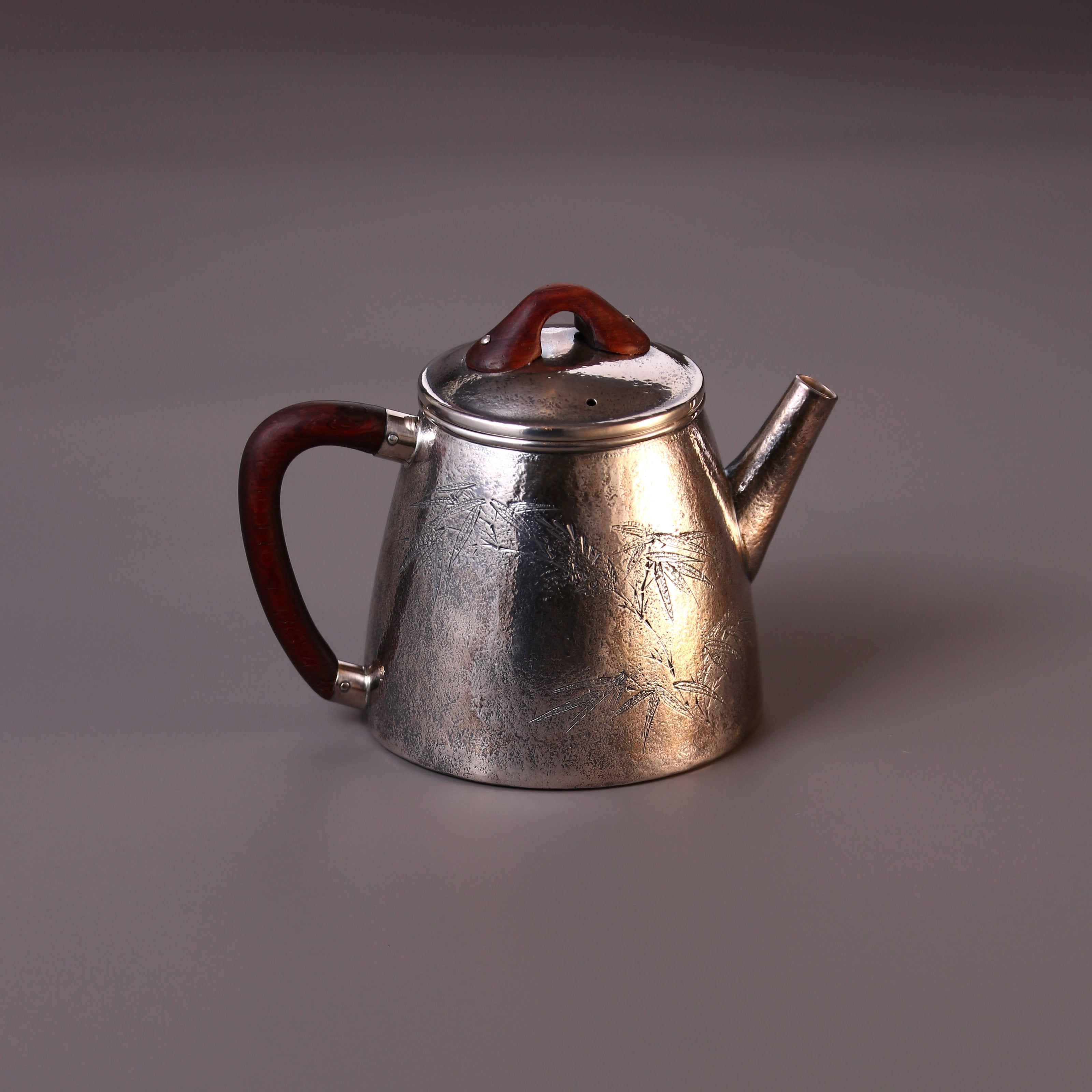 High stone silver tea pot