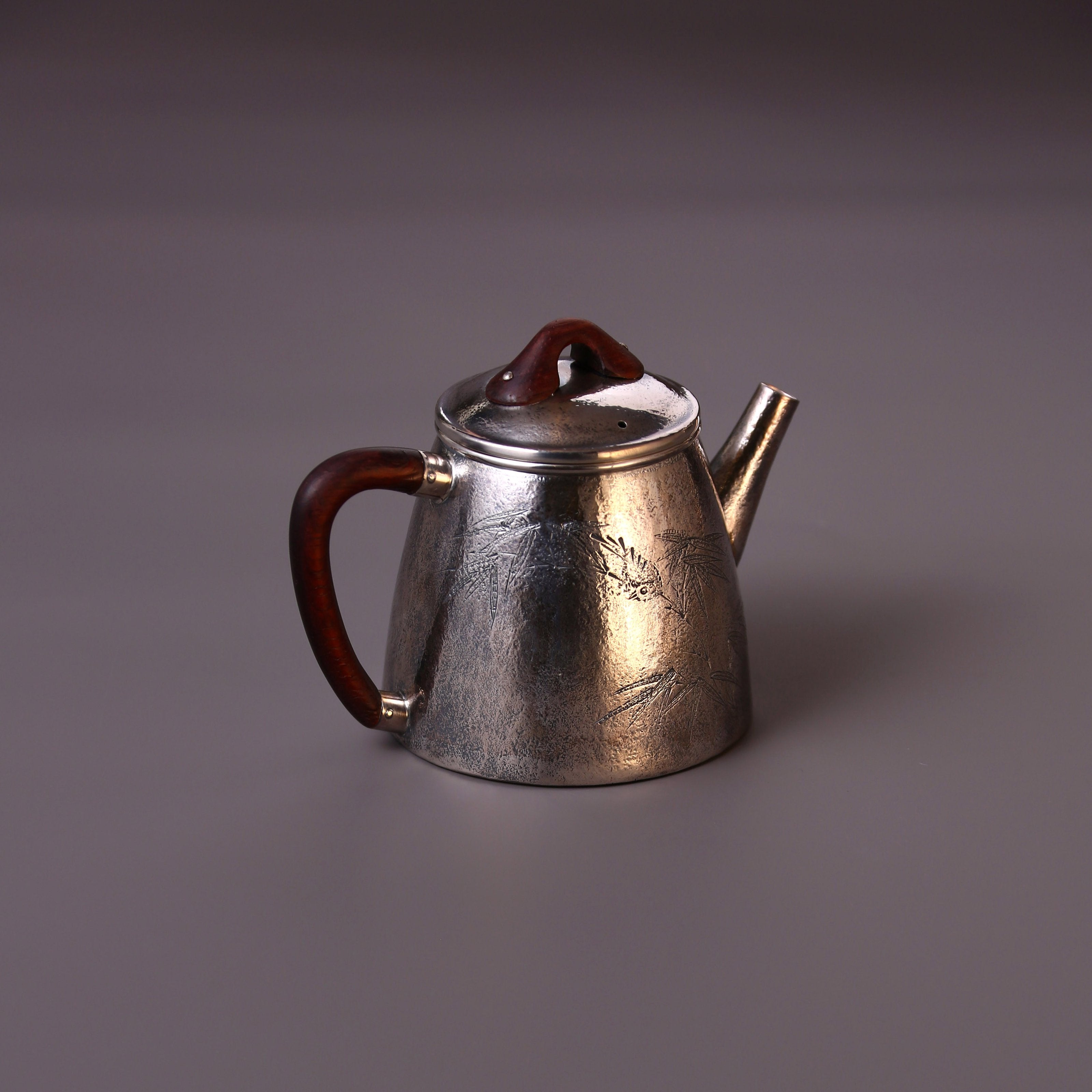 High stone silver tea pot