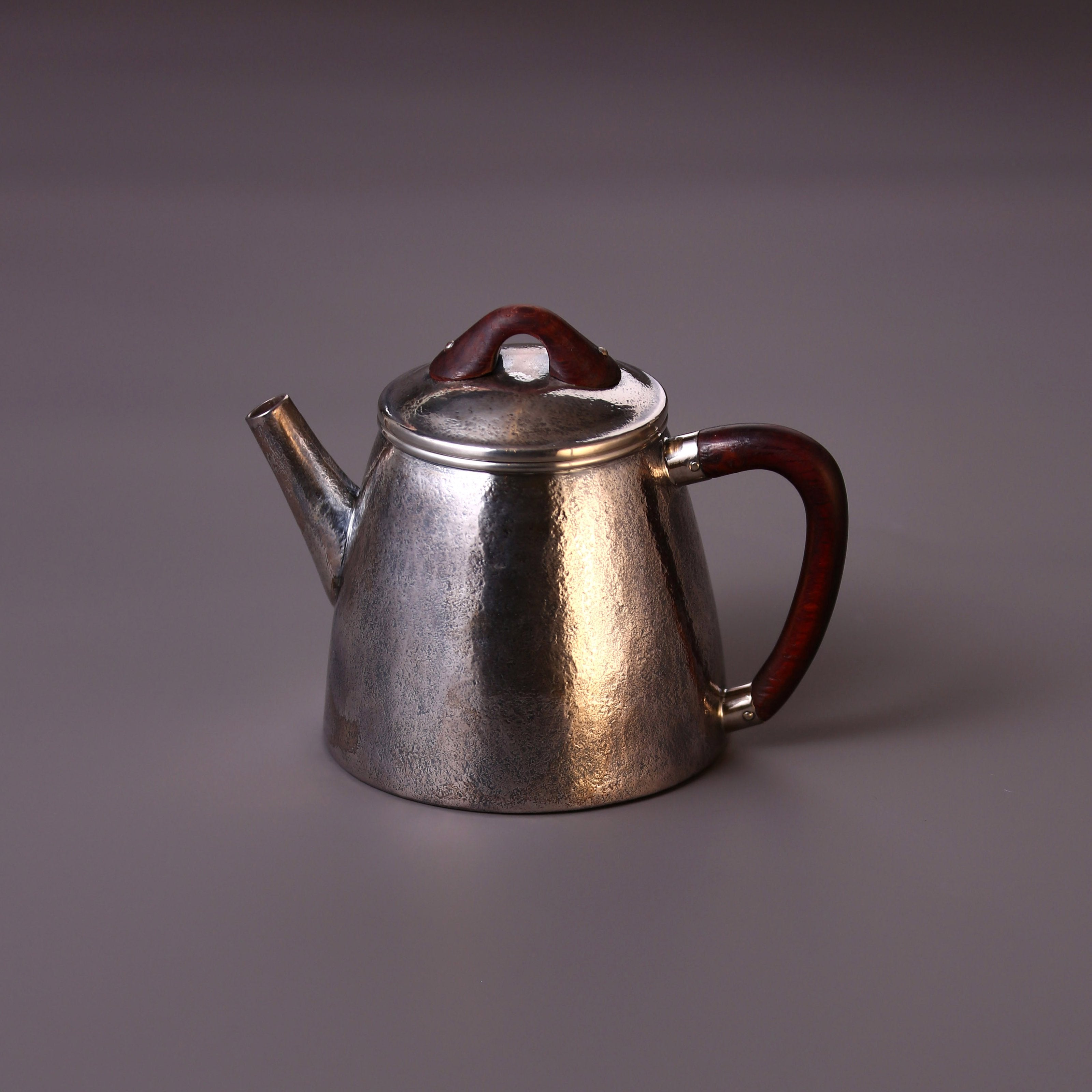 High stone silver tea pot