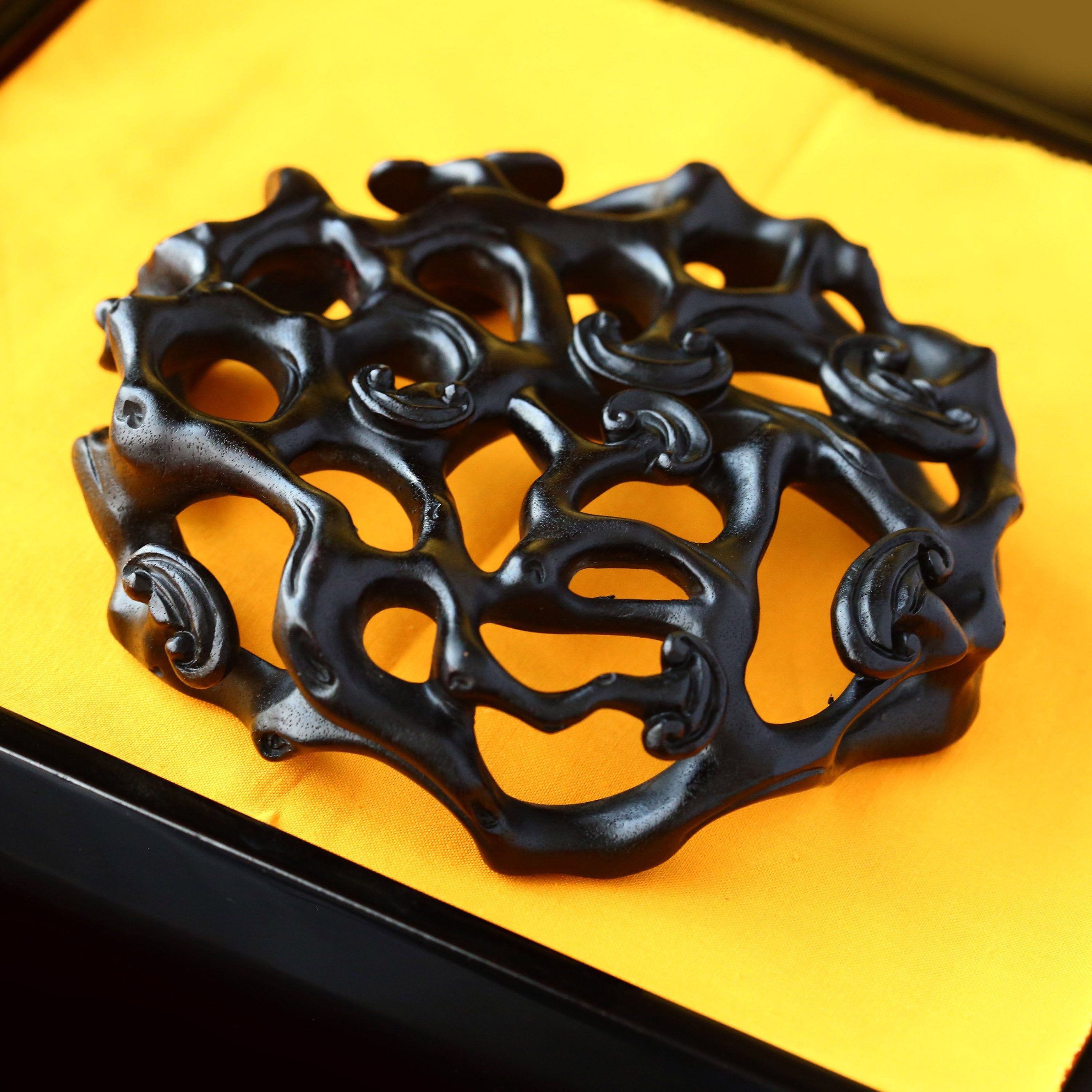 Three pieces with rosewood base featuring plum blossom, lingzhi, and begonia patterns.