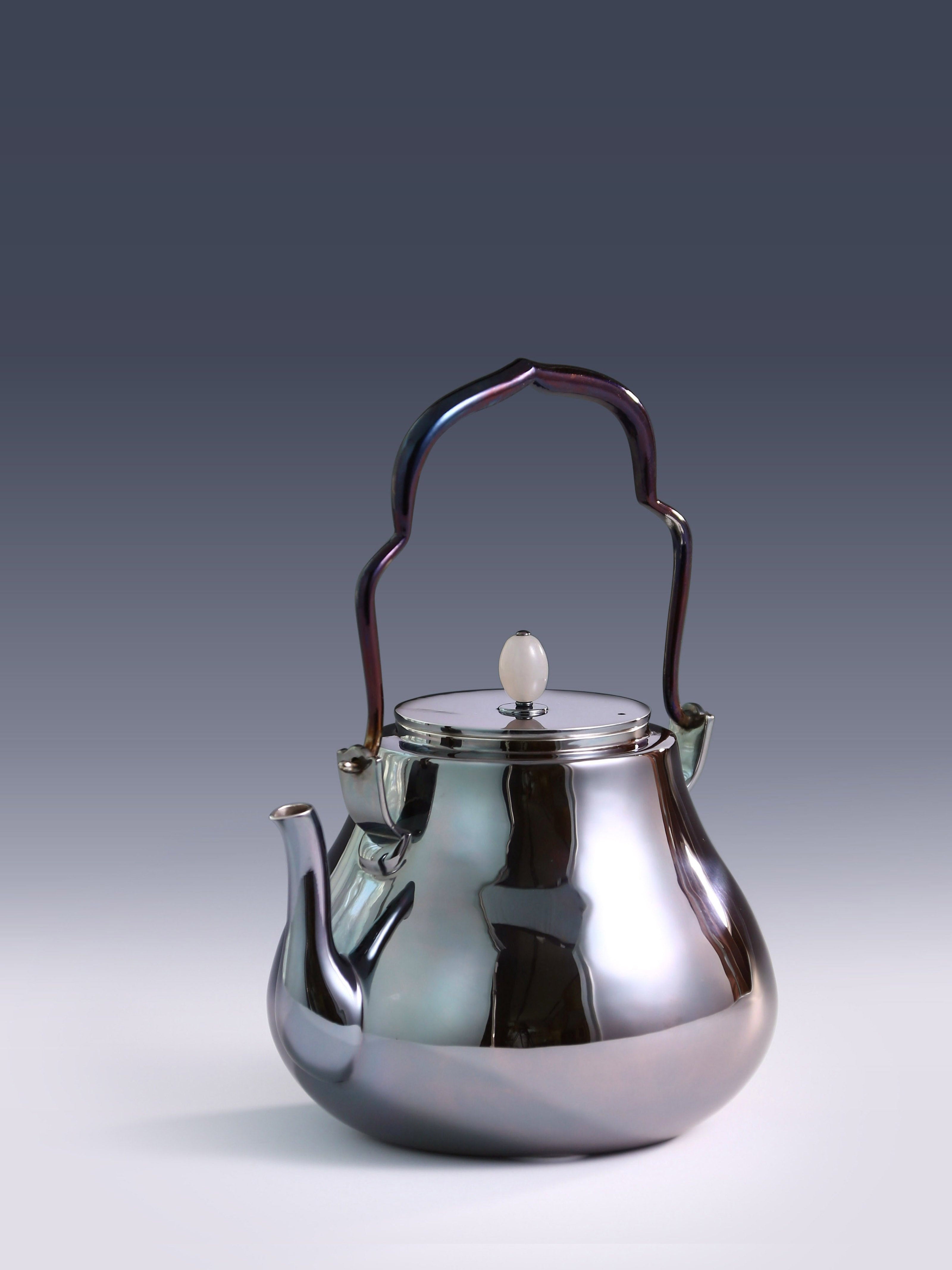 Crane-headed pure silver teapot