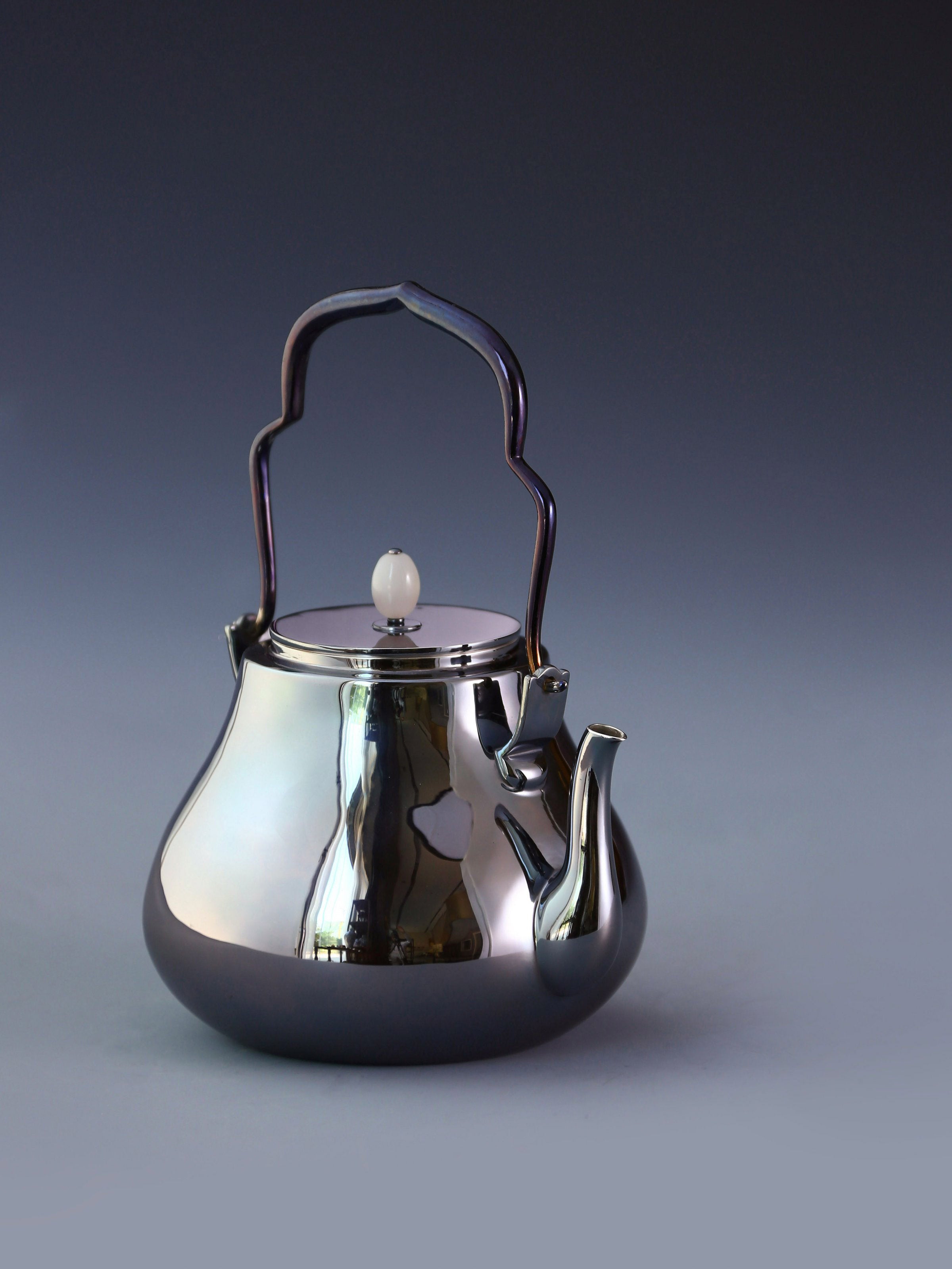 Crane-headed pure silver teapot