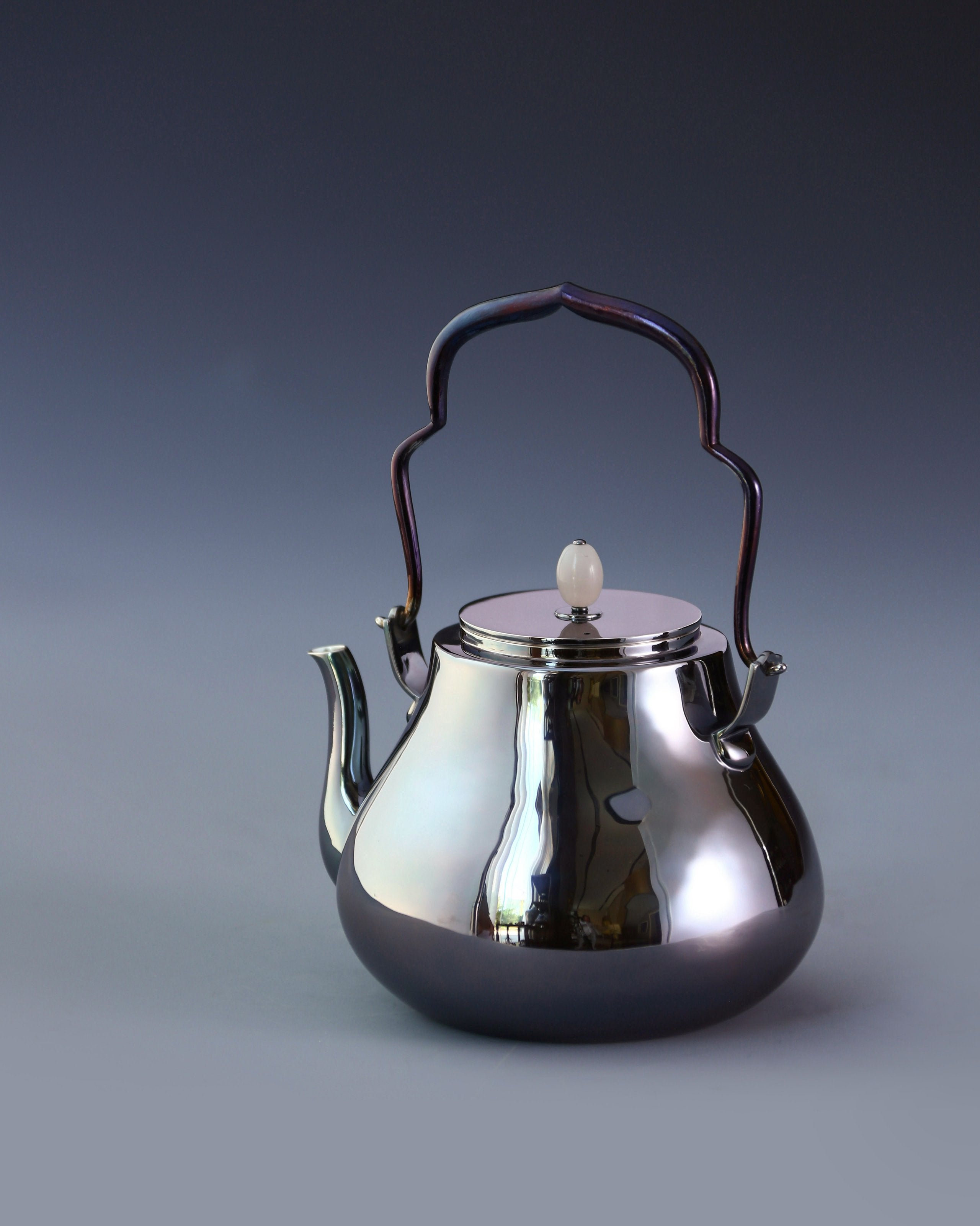 Crane-headed pure silver teapot