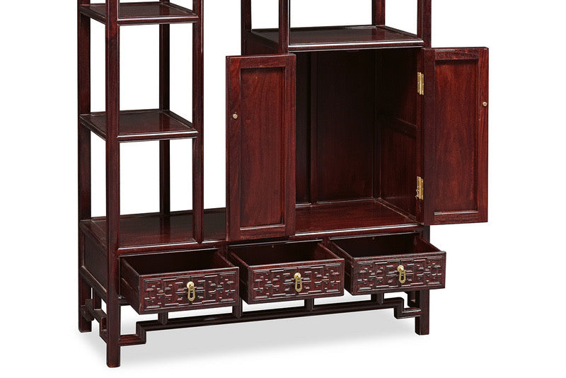 A pair of Zambian rosewood display shelves with fretwork design