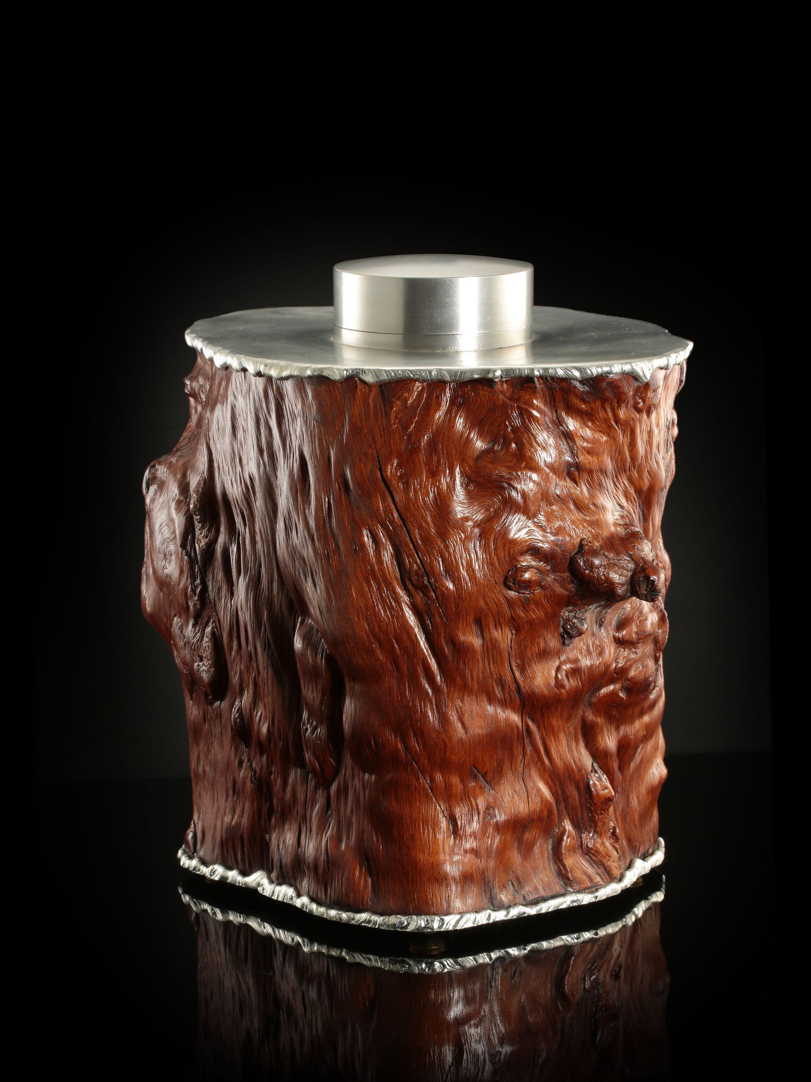 Tough and sturdy tin-carved burl wood tea caddy