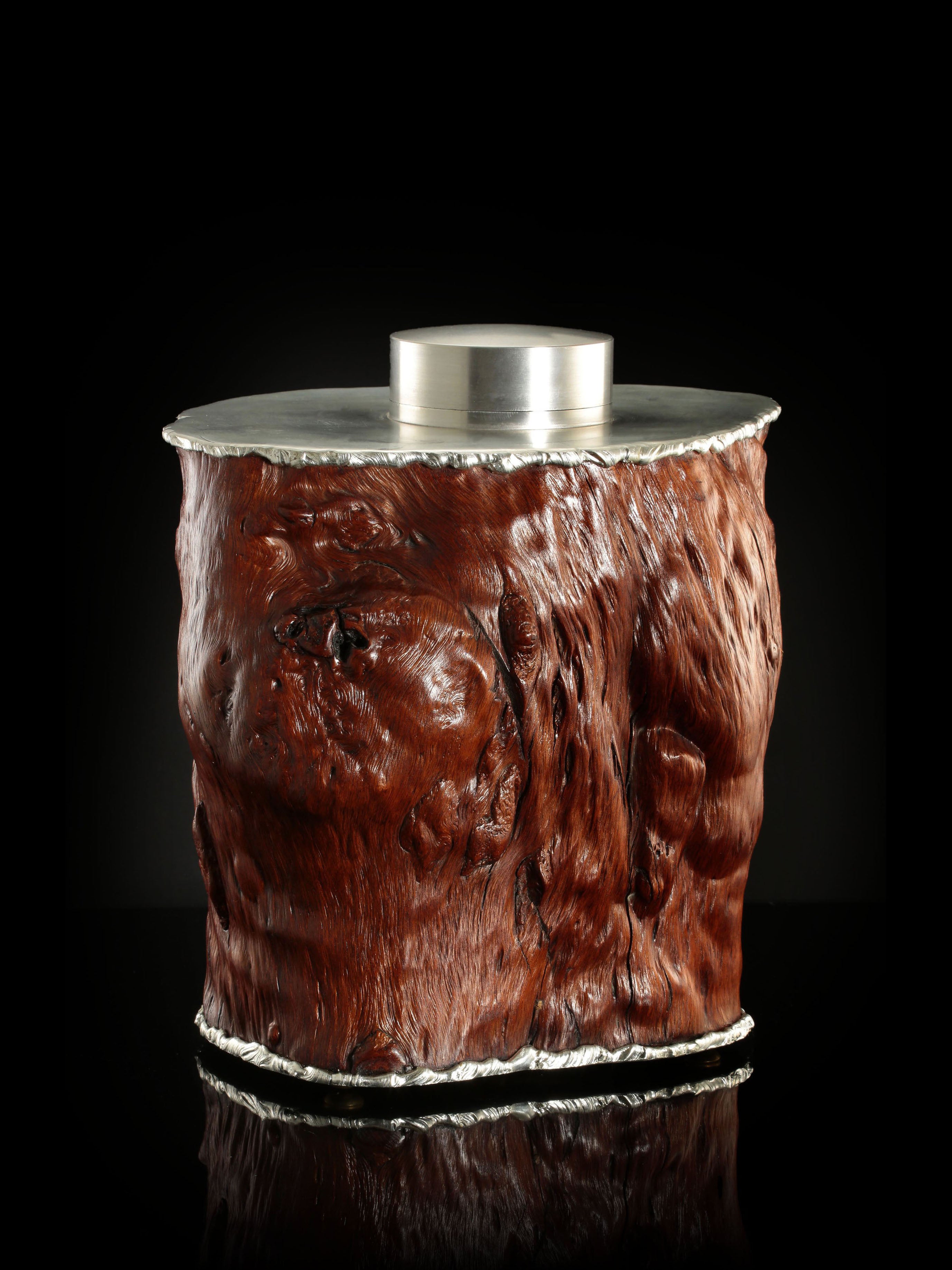 Tough and sturdy tin-carved burl wood tea caddy