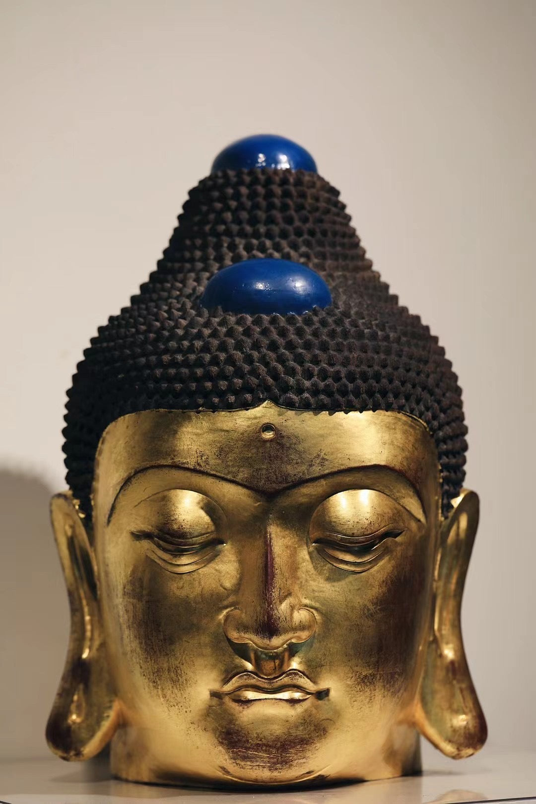 Ebony and Gold Leaf Buddha Head
