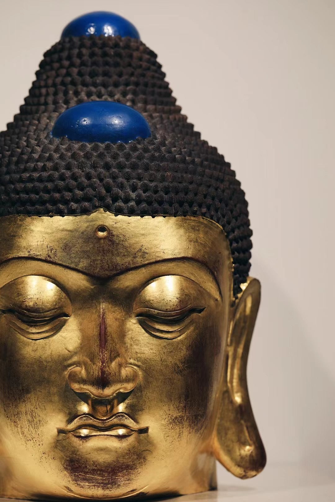Ebony and Gold Leaf Buddha Head