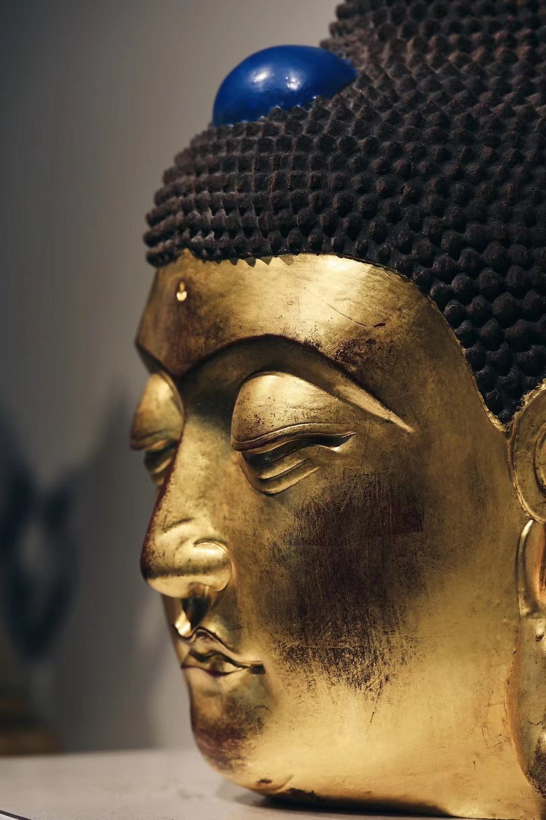 Ebony and Gold Leaf Buddha Head