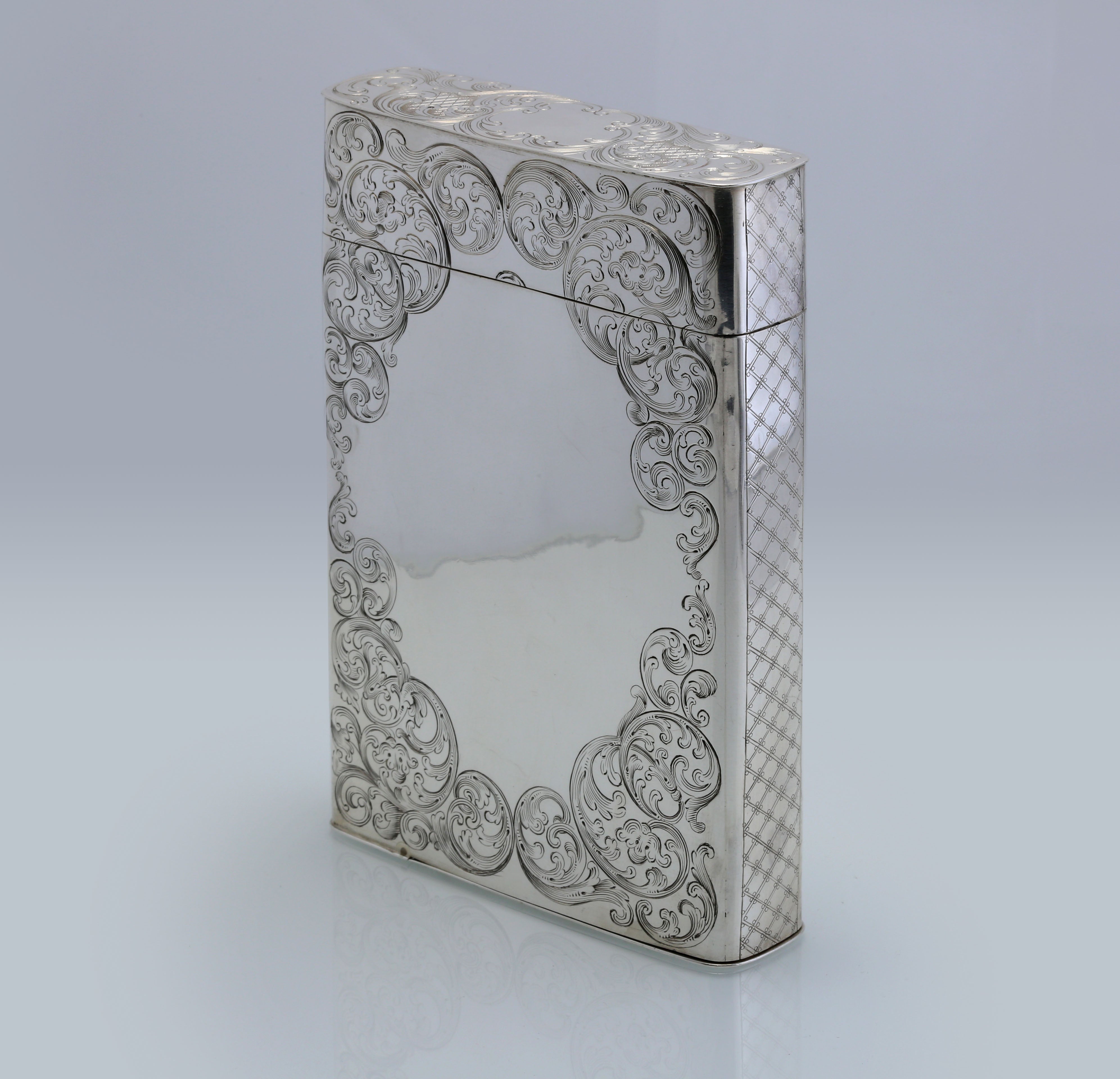 Sterling silver cigar box with engraved scrollwork, made in Dublin, England, 1867-1868.