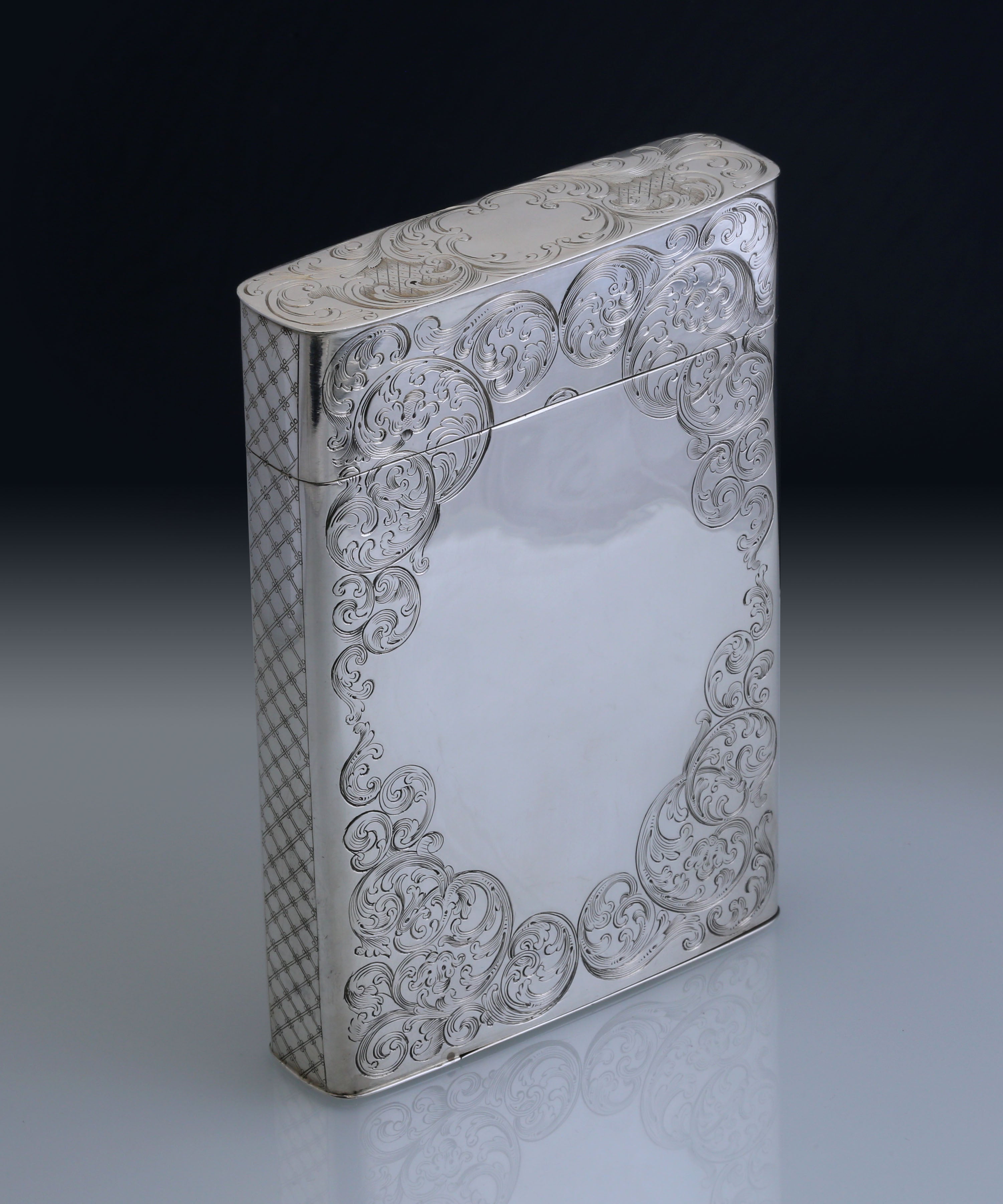 Sterling silver cigar box with engraved scrollwork, made in Dublin, England, 1867-1868.