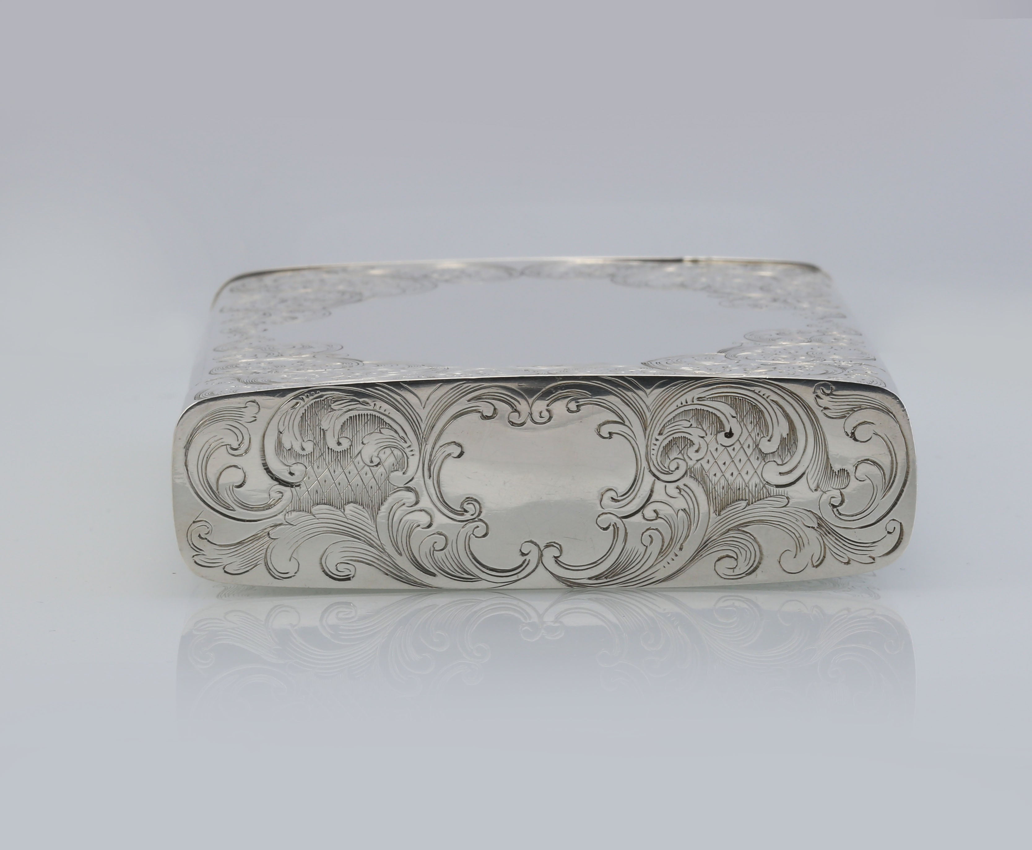 Sterling silver cigar box with engraved scrollwork, made in Dublin, England, 1867-1868.
