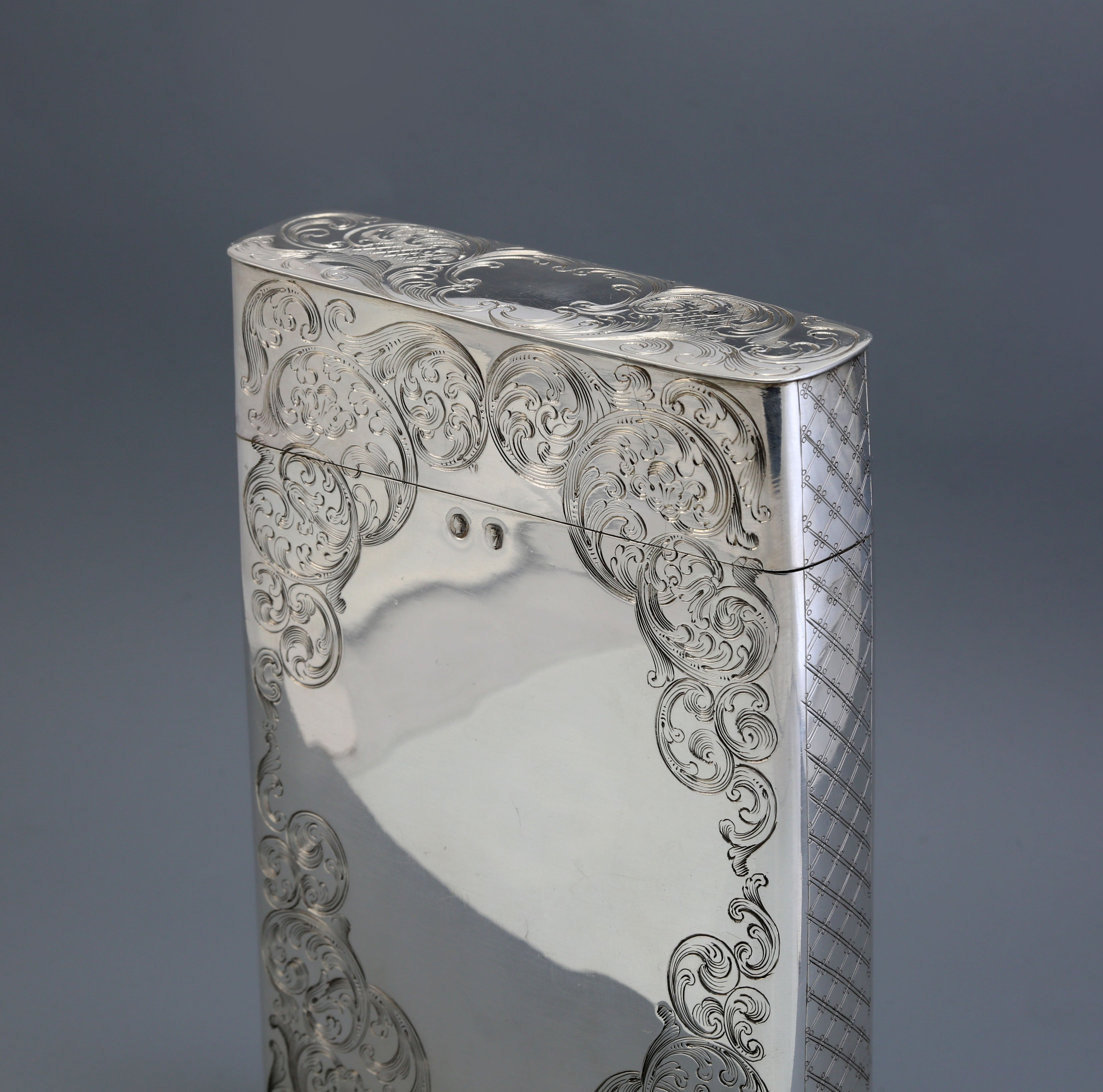 Sterling silver cigar box with engraved scrollwork, made in Dublin, England, 1867-1868.