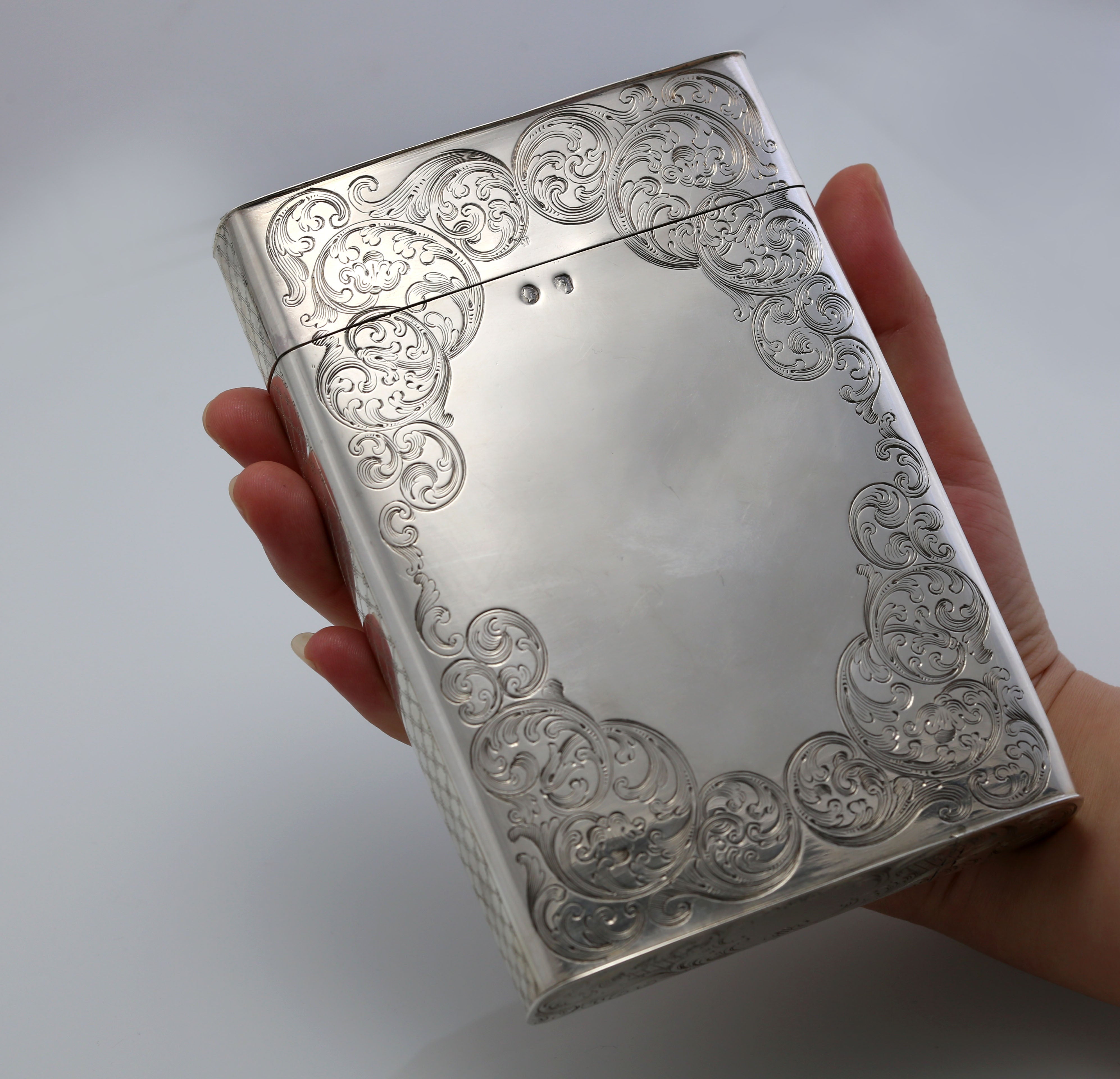 Sterling silver cigar box with engraved scrollwork, made in Dublin, England, 1867-1868.